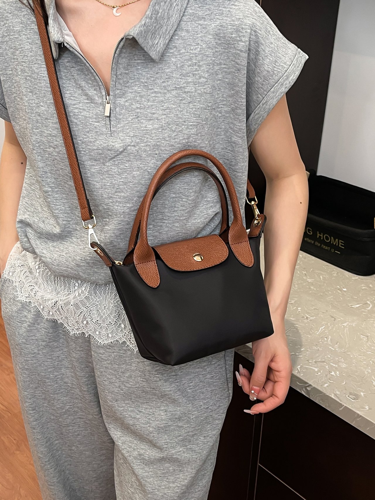 Black Crossbody Bag with Brown Accents