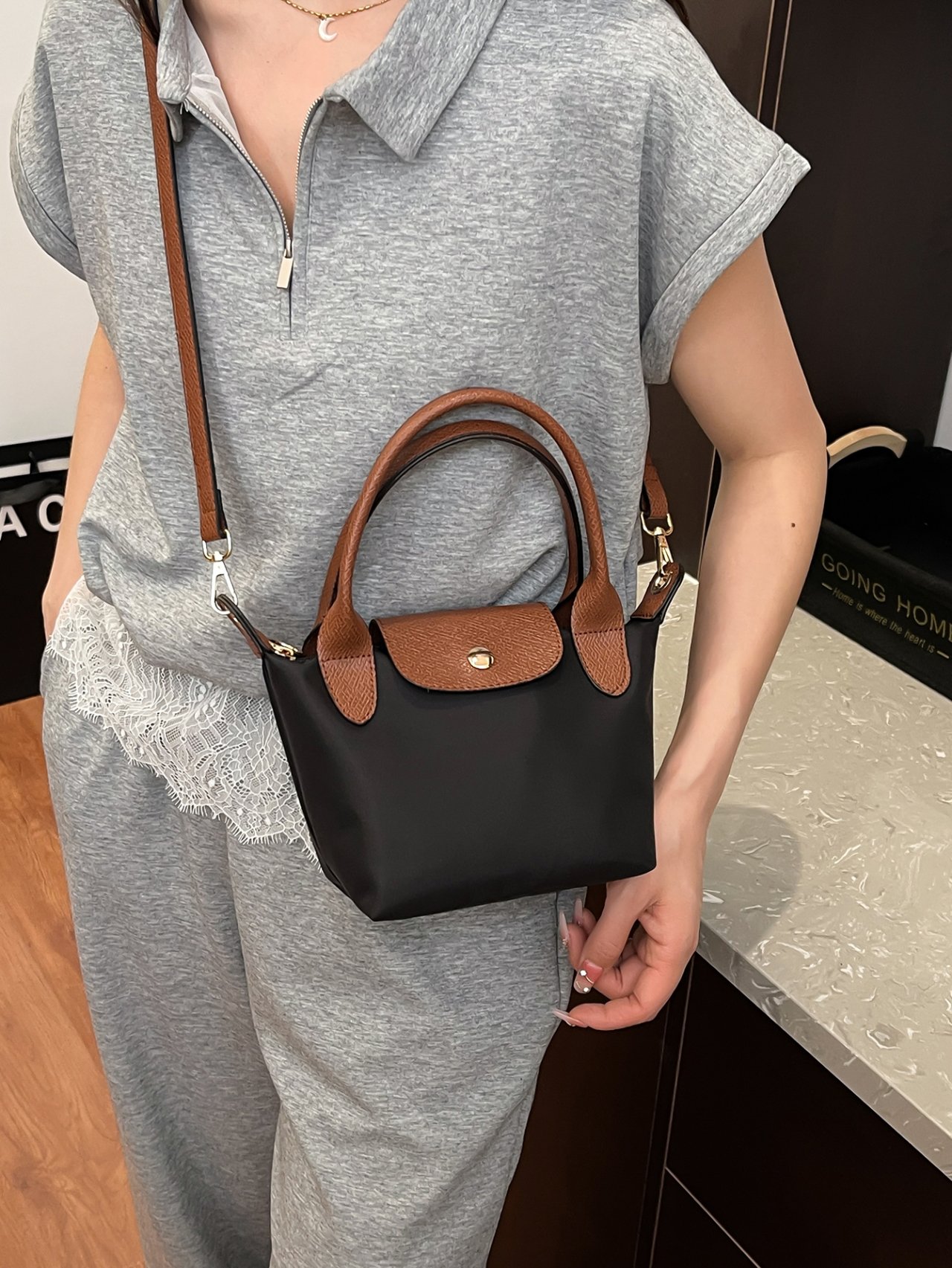 Black Crossbody Bag with Brown Accents