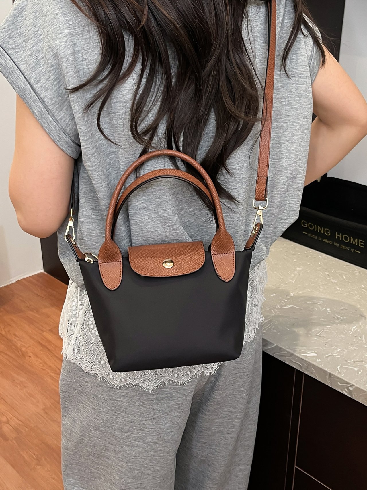 Black Crossbody Bag with Brown Accents