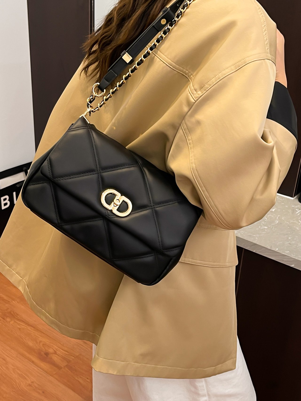 Black Quilted Crossbody Bag with Gold Chain