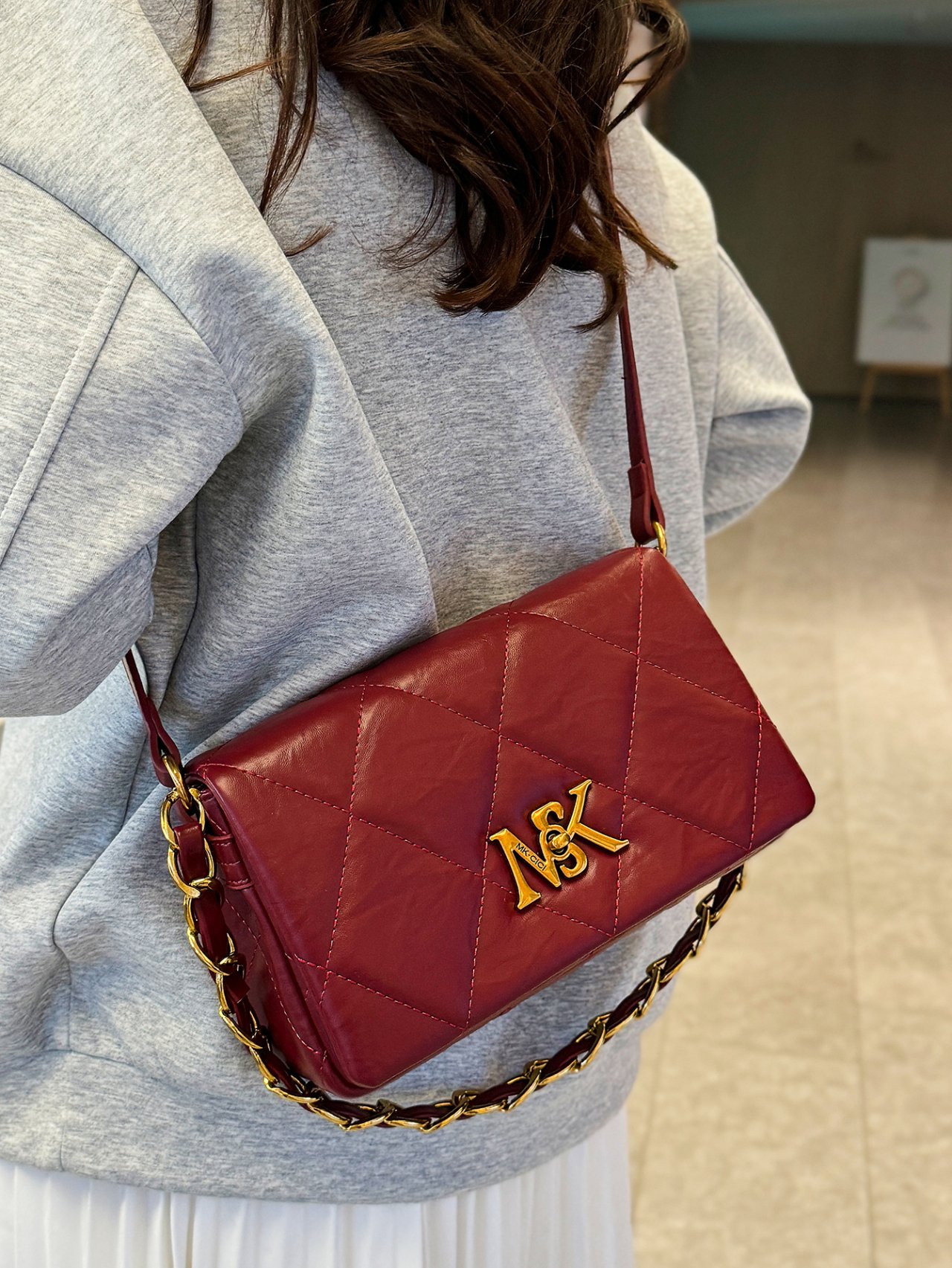 Red Quilted Crossbody Bag with Gold Chain