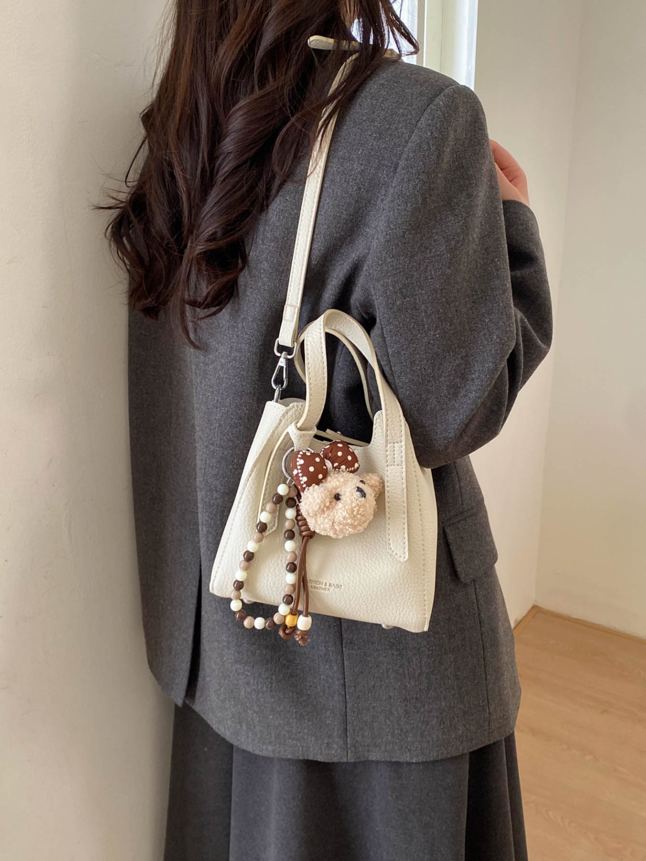 Off-White Crossbody Bag with Charm