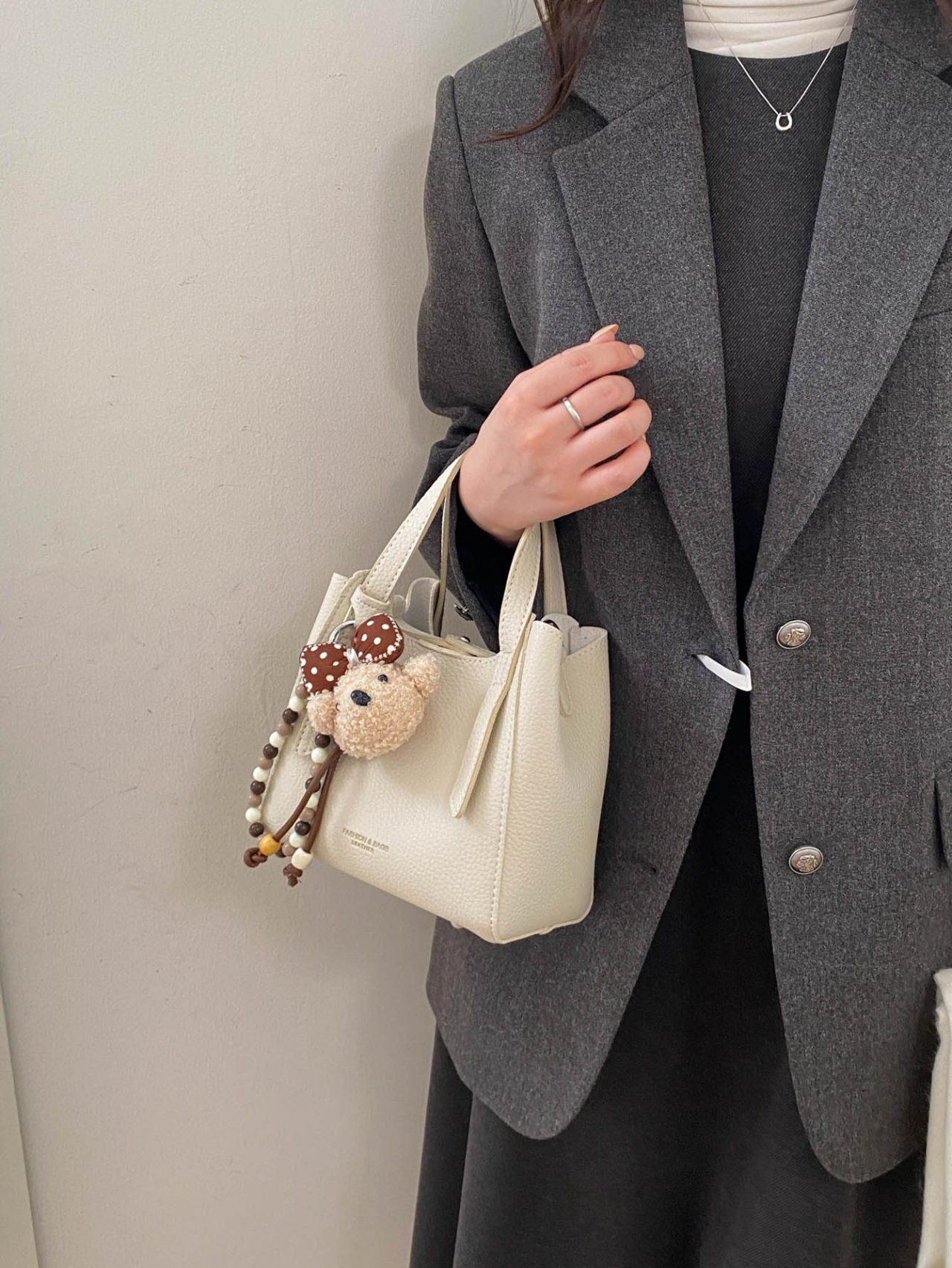 Off-White Crossbody Bag with Charm