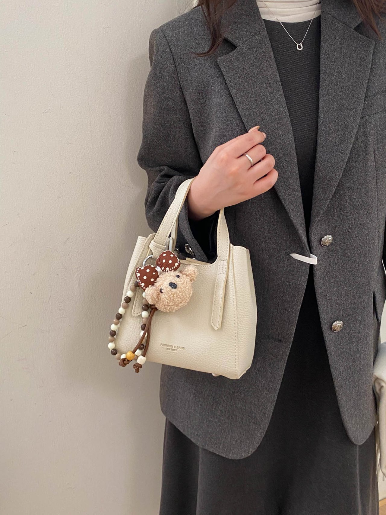 Off-White Crossbody Bag with Charm