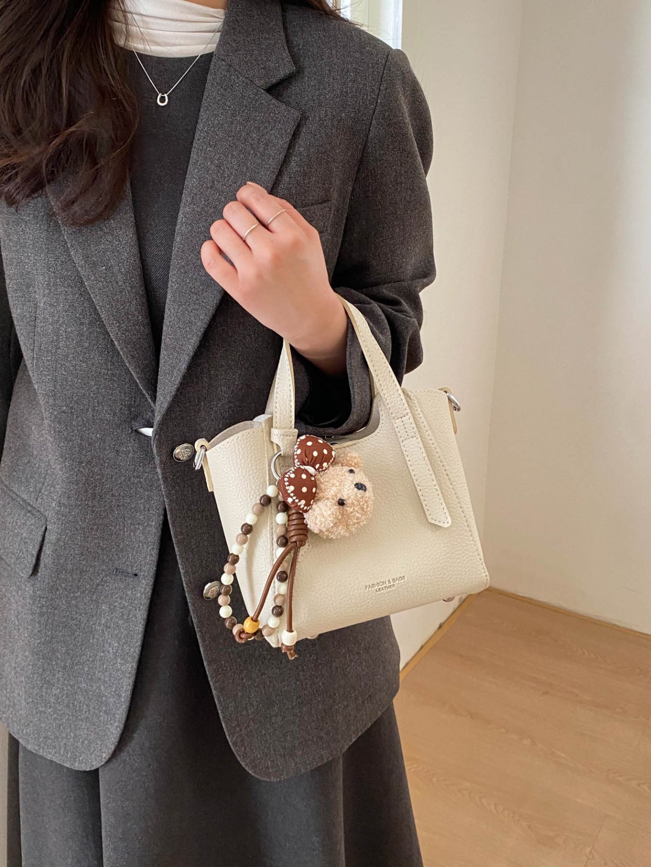 Off-White Crossbody Bag with Charm