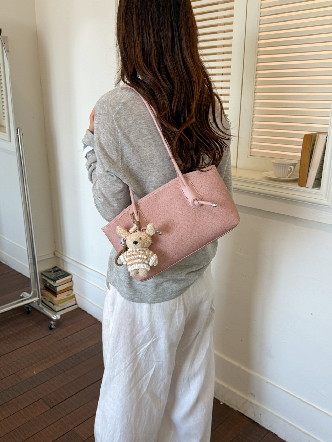 Pink Textured Handbag with Charm