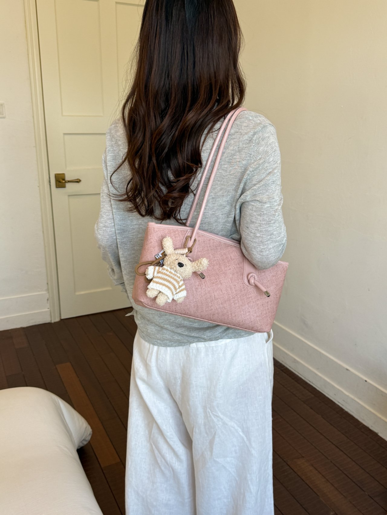 Pink Textured Handbag with Charm