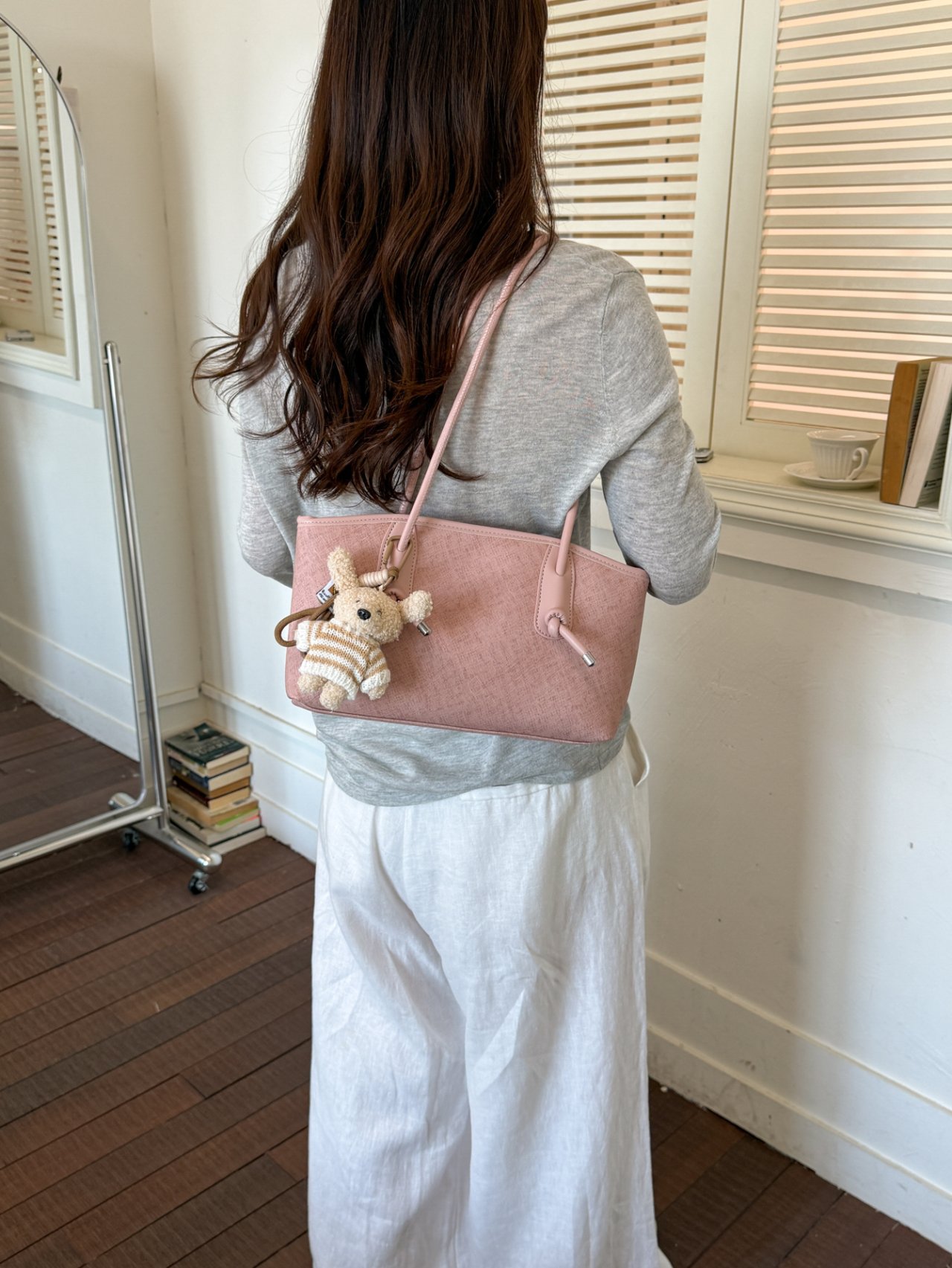 Pink Textured Handbag with Charm