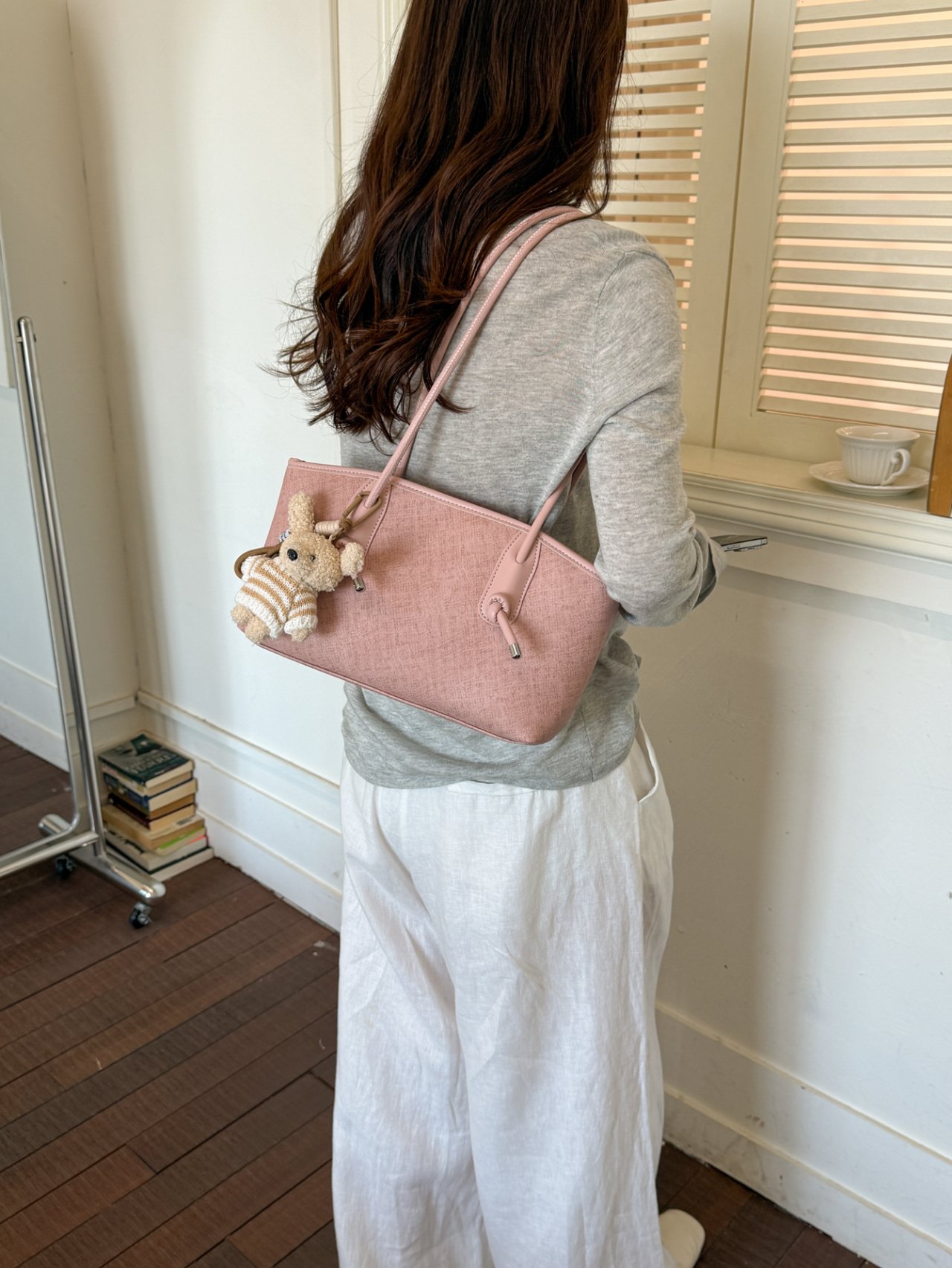 Pink Textured Handbag with Charm