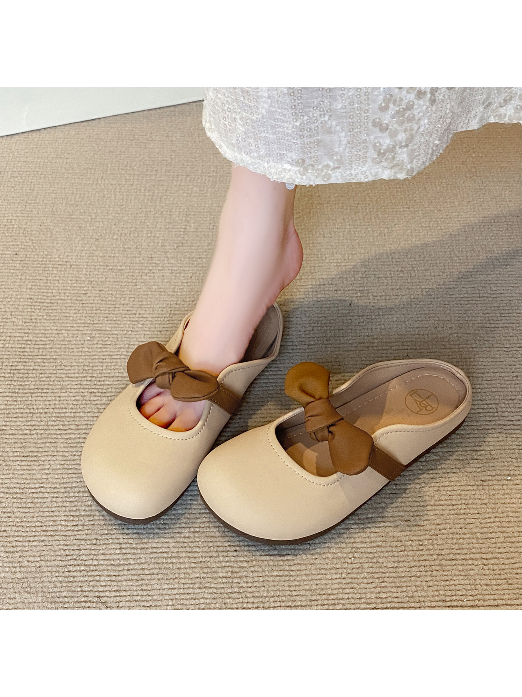 Beige Flat Mules with Bow Detail