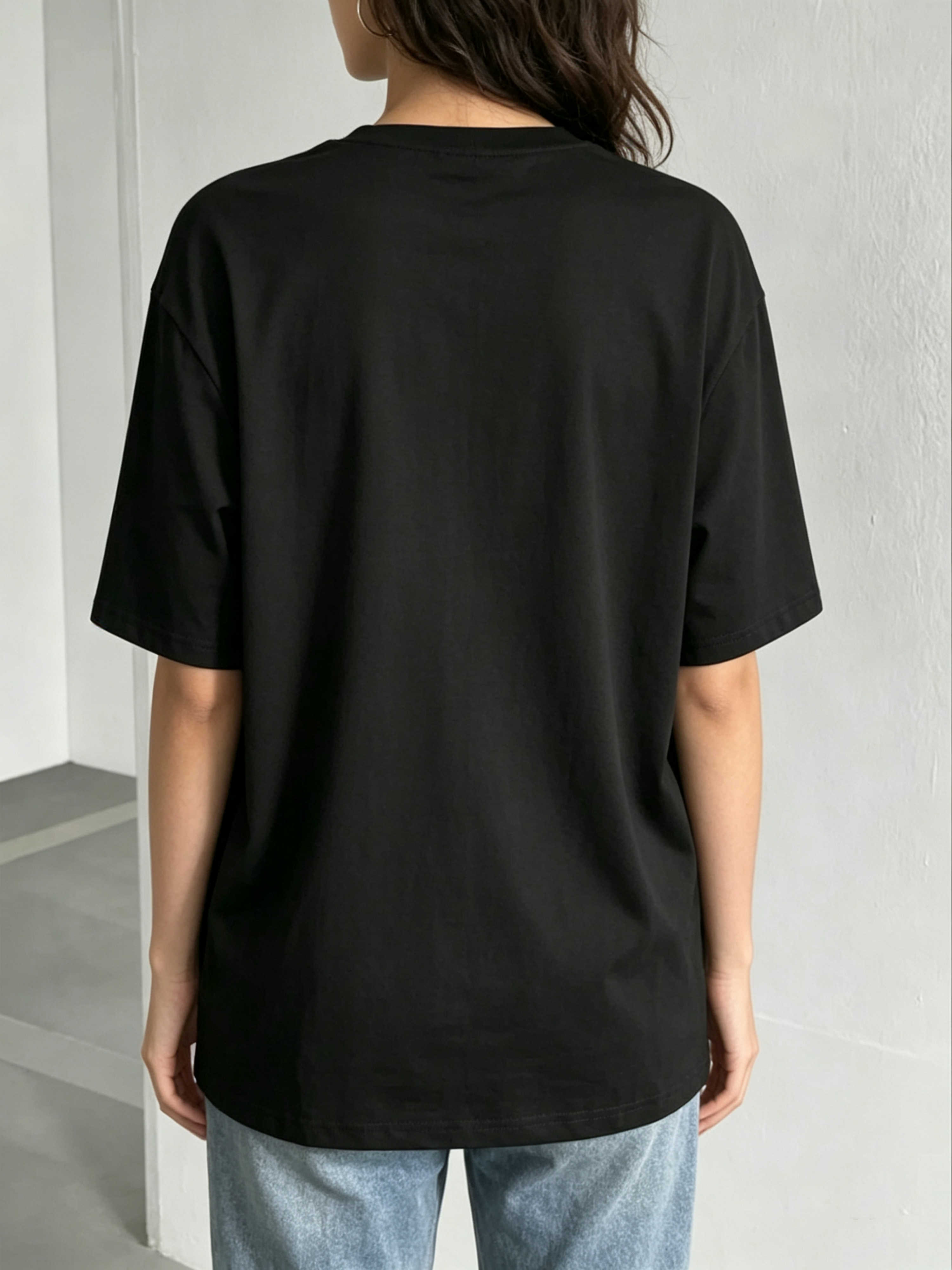 Black Knitted T-Shirt with Embroidered Floral Design