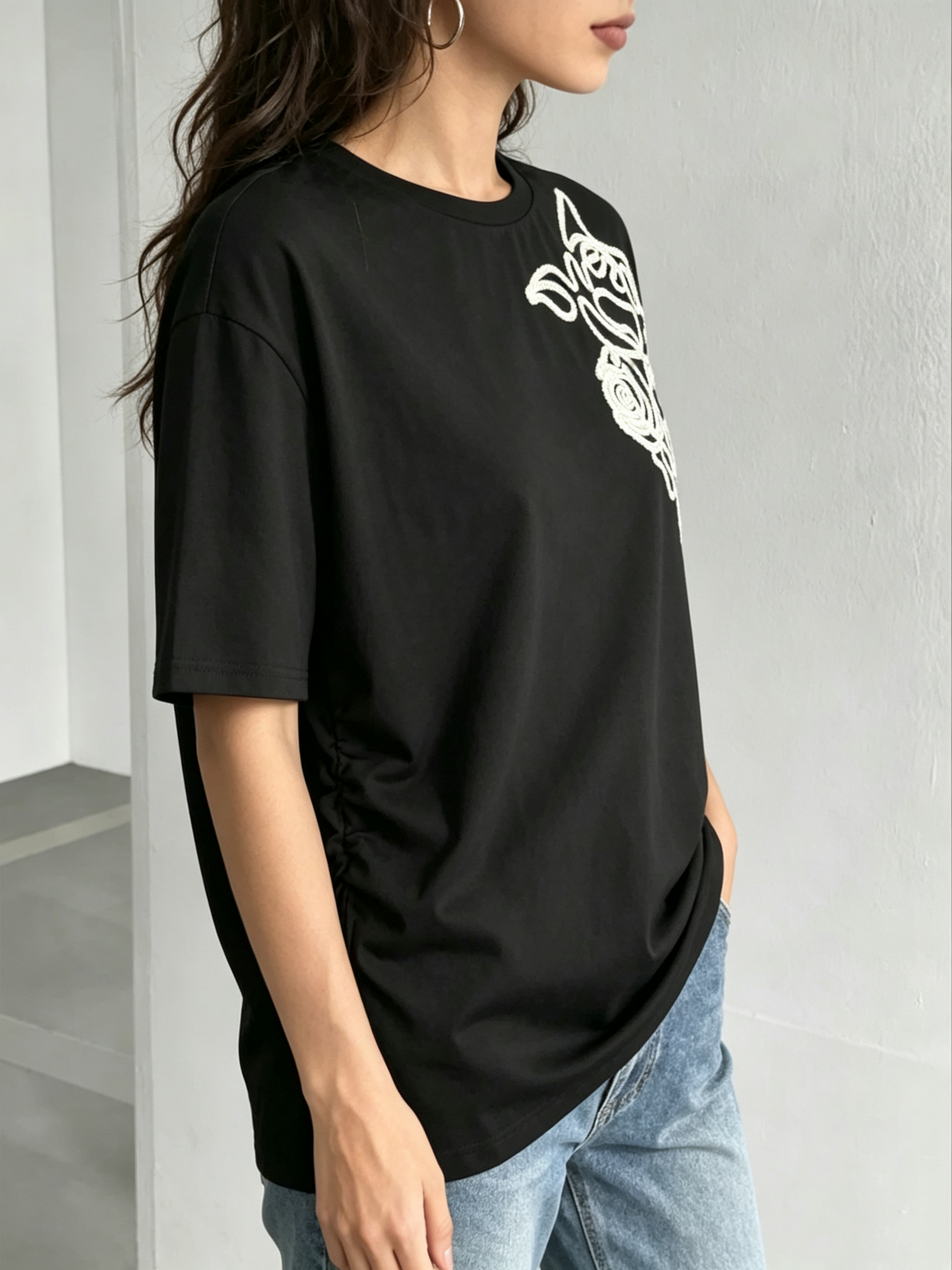 Black Knitted T-Shirt with Embroidered Floral Design