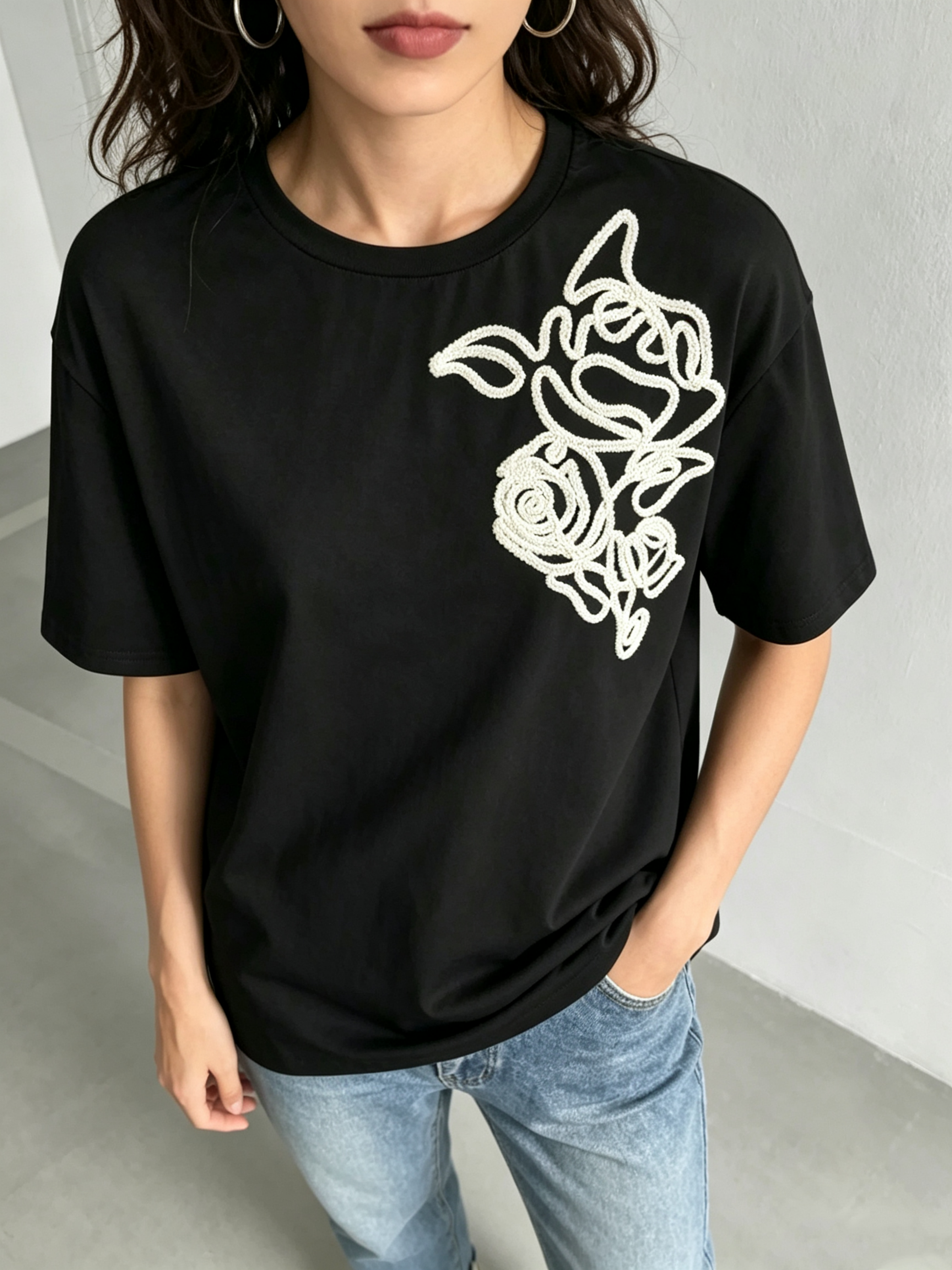 Black Knitted T-Shirt with Embroidered Floral Design