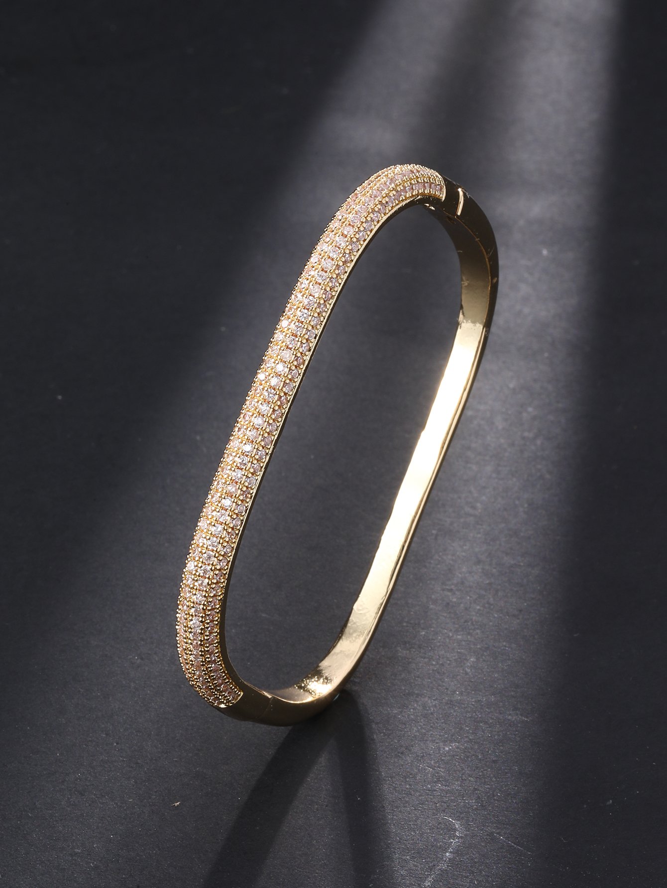 Gold Bangle Bracelet with Shimmering Zirconia