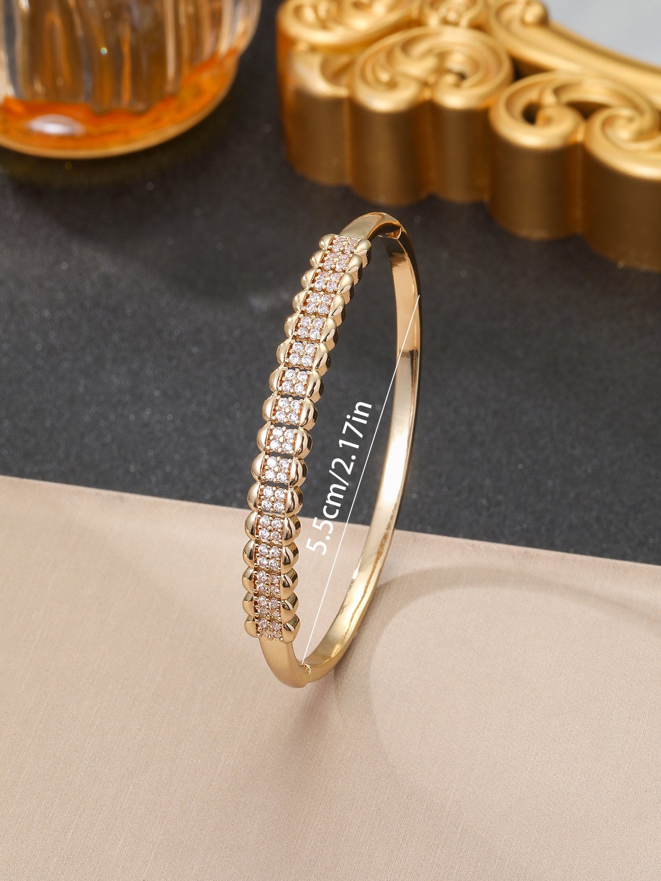 Gold Bangle Bracelet with Shimmering Zirconia