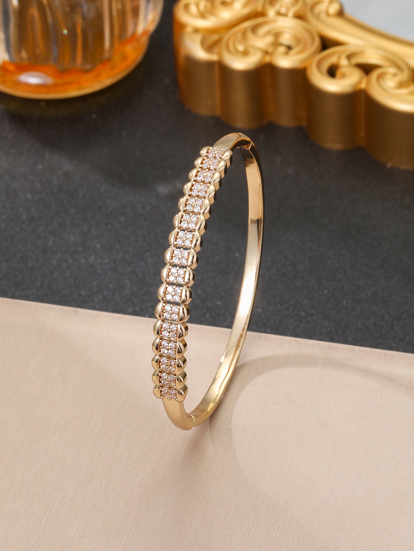Gold Bangle Bracelet with Shimmering Zirconia