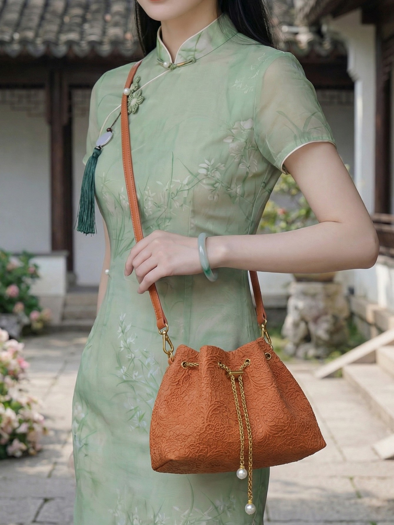 Rust Embossed Drawstring Crossbody Bag