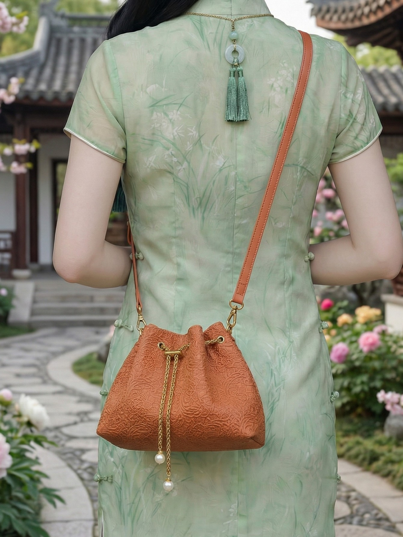 Rust Embossed Drawstring Crossbody Bag