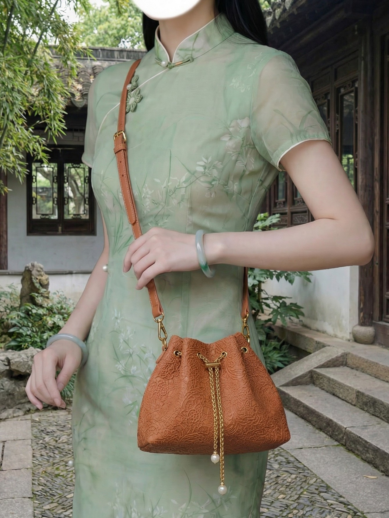 Rust Embossed Drawstring Crossbody Bag