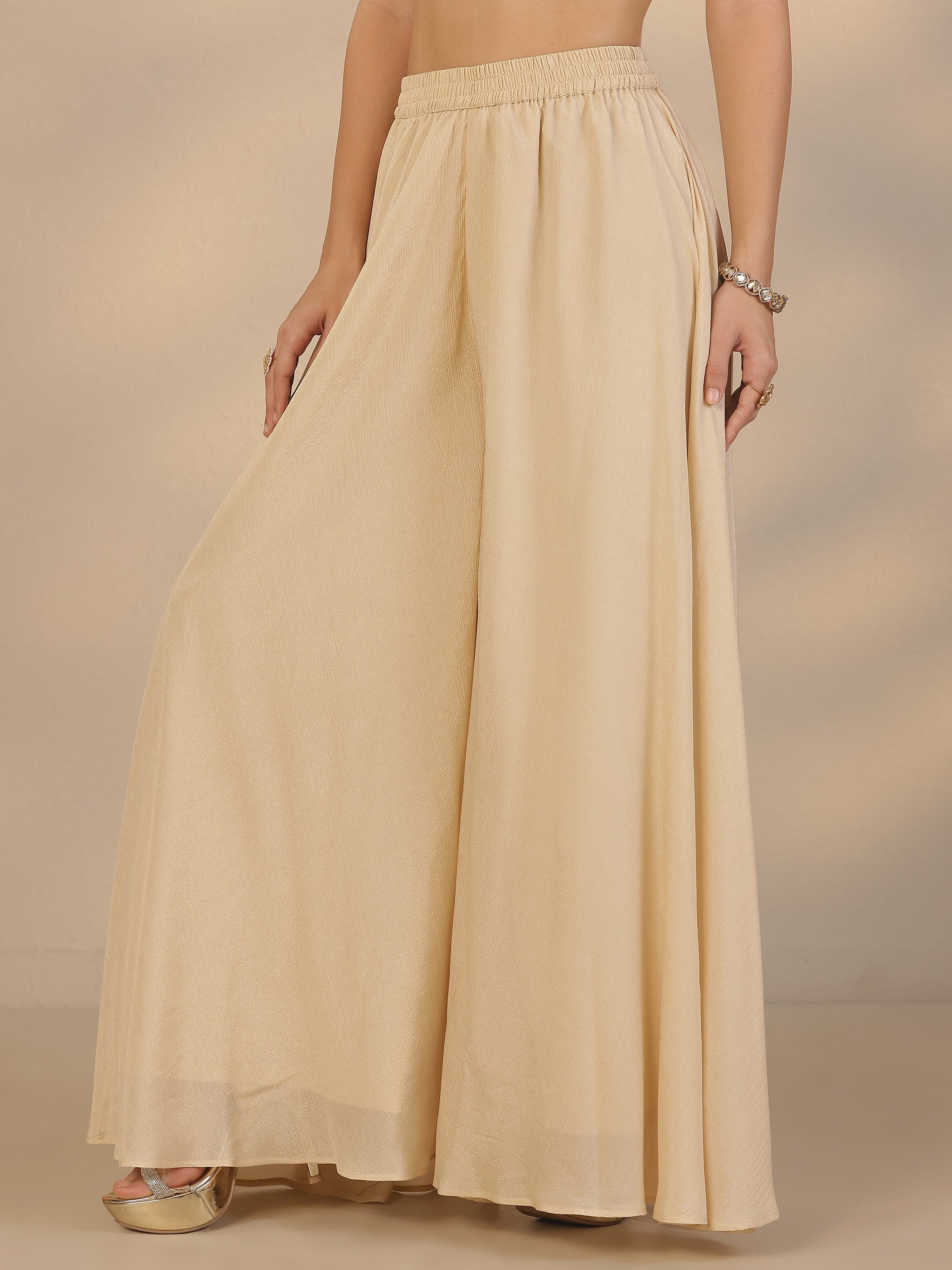 Gold Embroidered Sleeveless Kurta Set with Flared Palazzo and Dupatta
