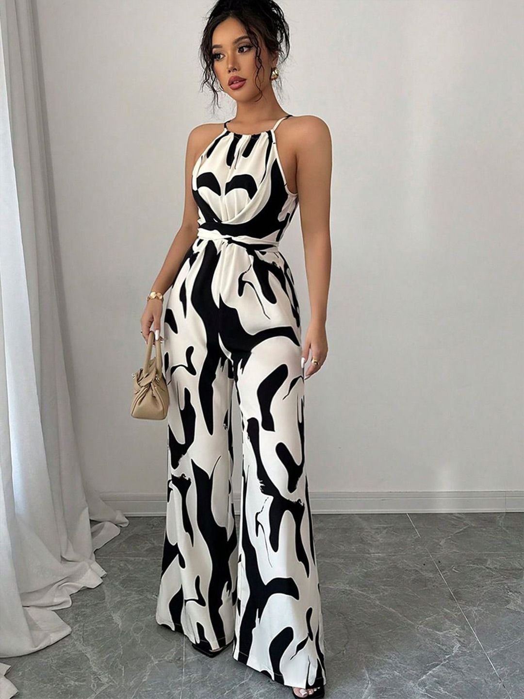 White and Black Abstract Print Halter Neck Jumpsuit