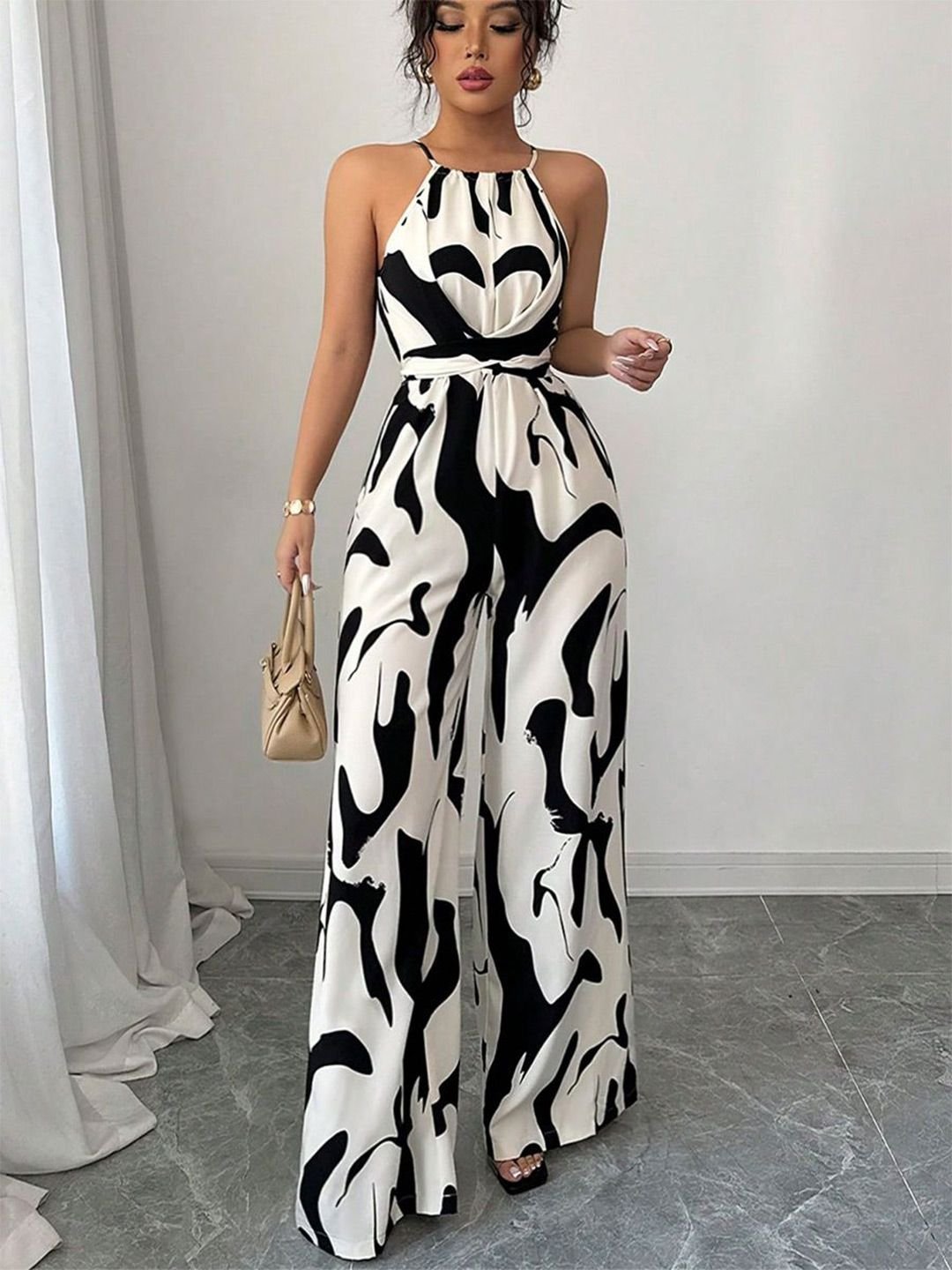 White and Black Abstract Print Halter Neck Jumpsuit