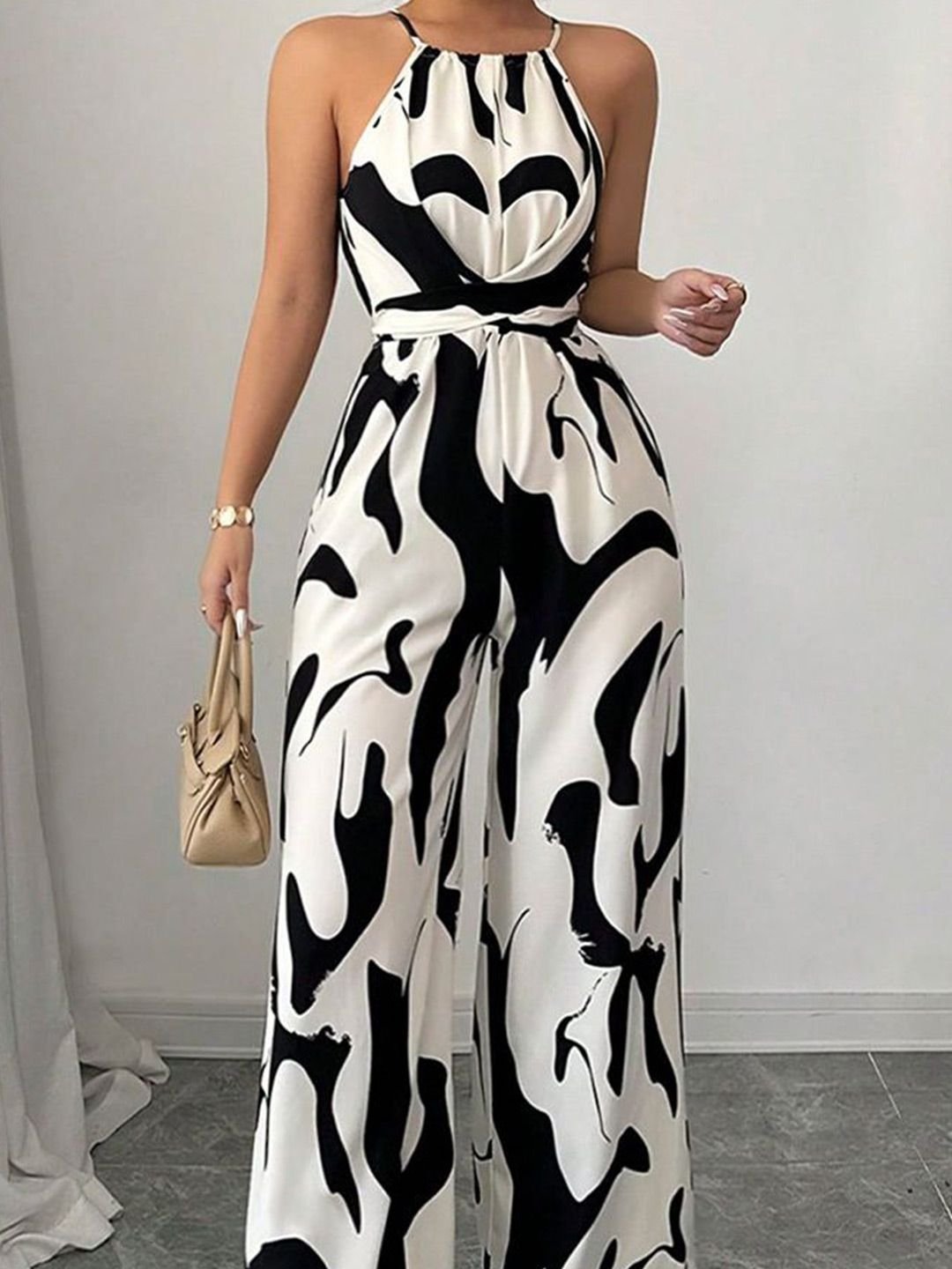 White and Black Abstract Print Halter Neck Jumpsuit