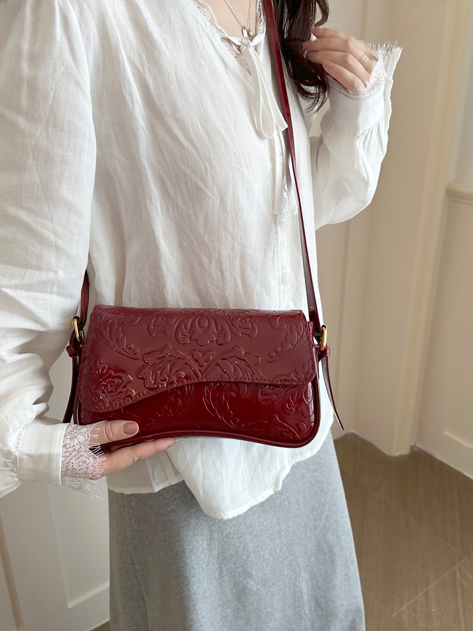 Red Embossed Shoulder Bag