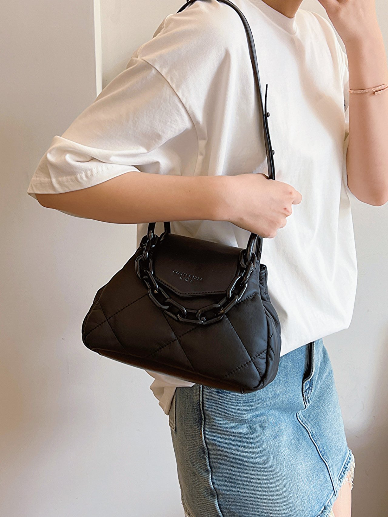 Black Quilted Crossbody Bag with Chain Detail