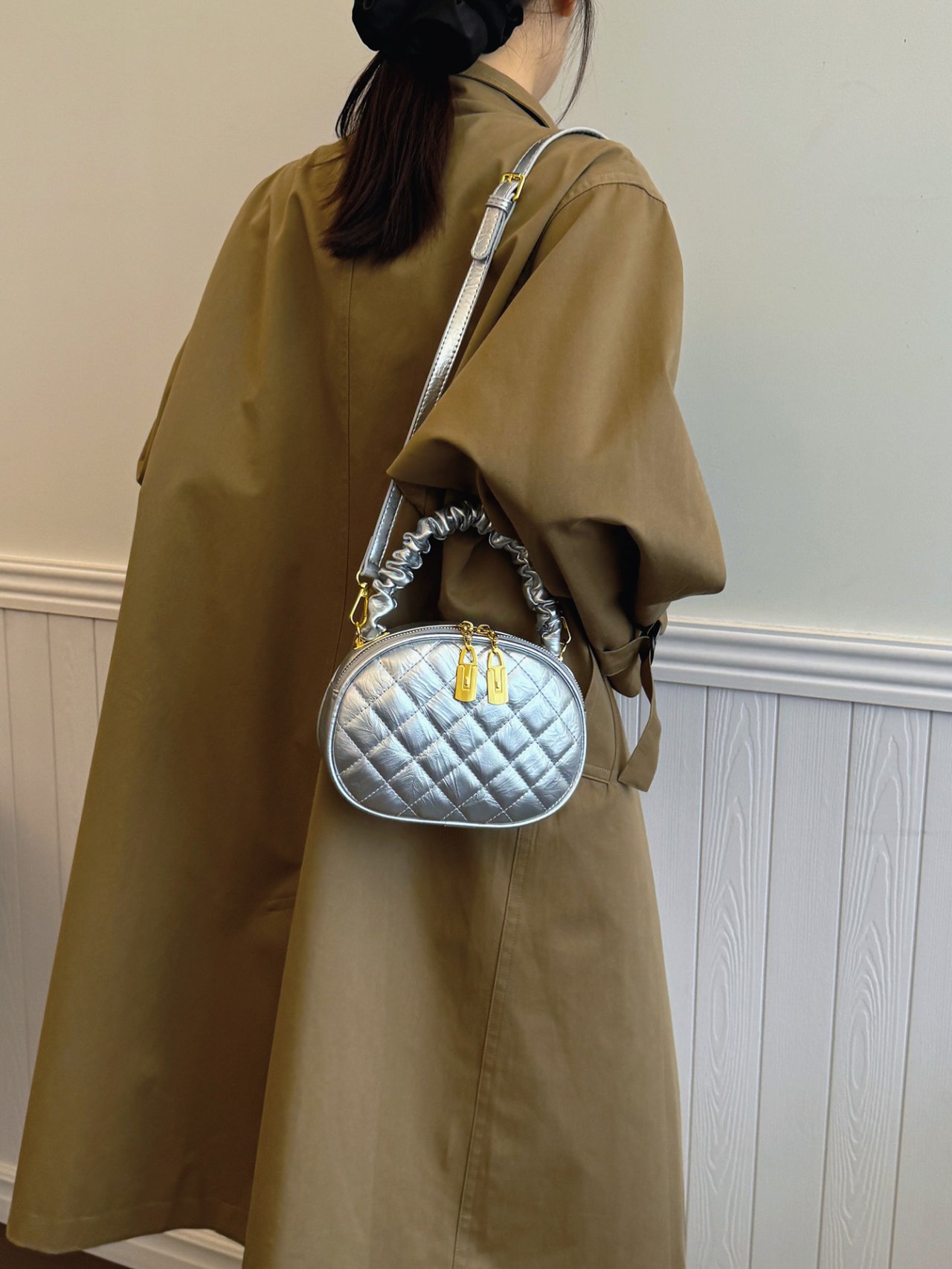 Silver Quilted Crossbody Bag with Gold Accents