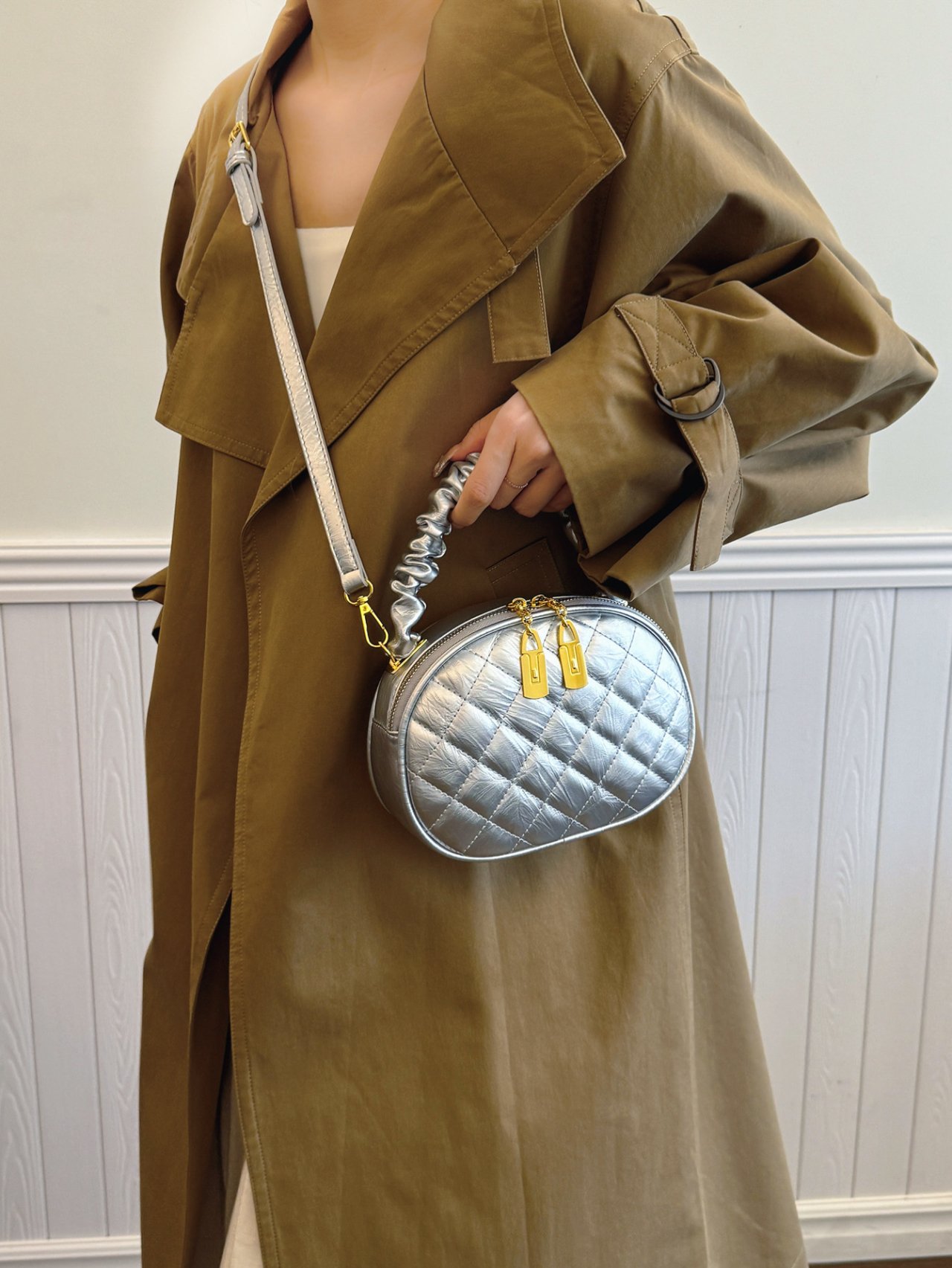 Silver Quilted Crossbody Bag with Gold Accents