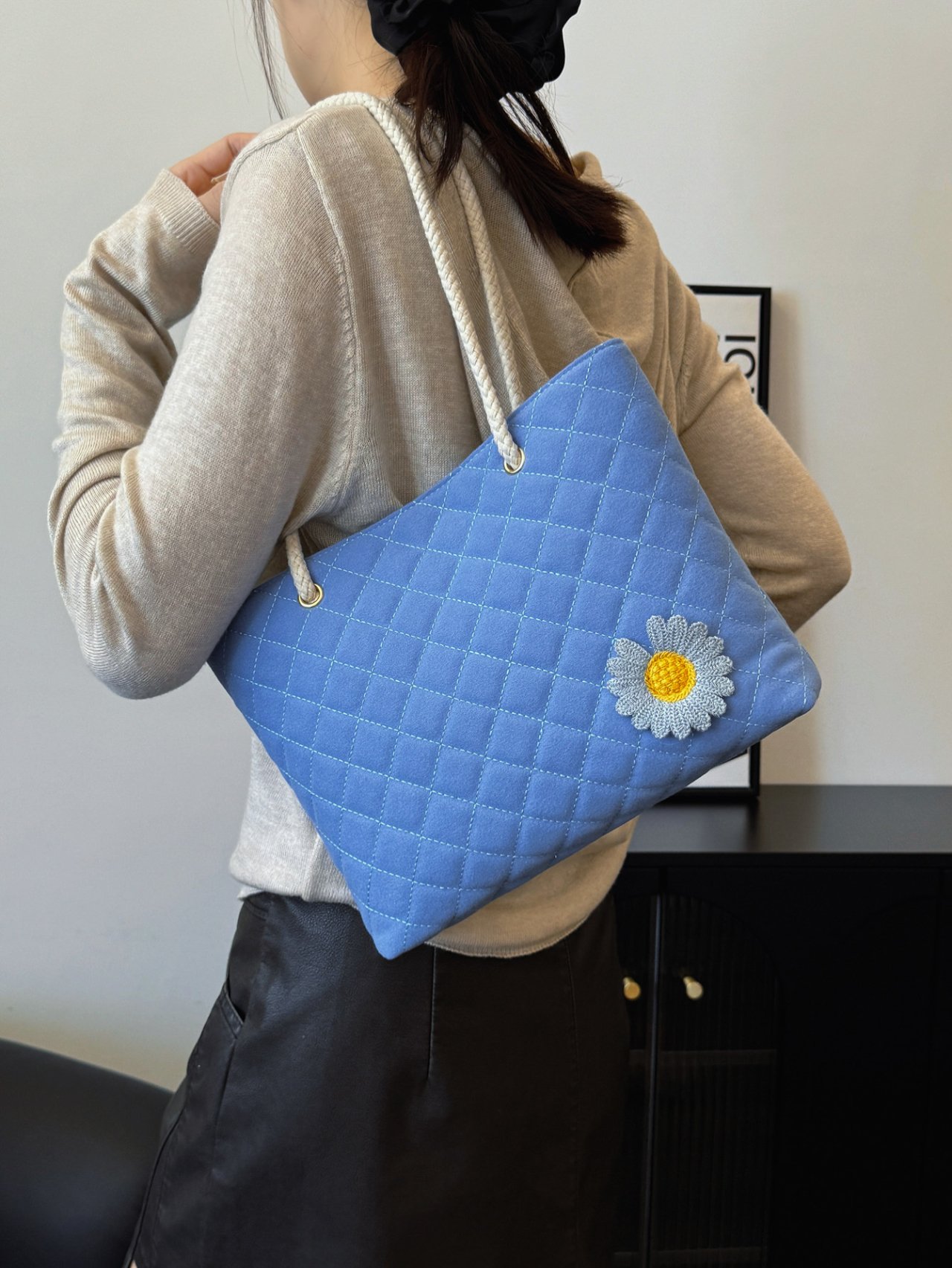 Blue Quilted Shoulder Bag with Daisy Accent
