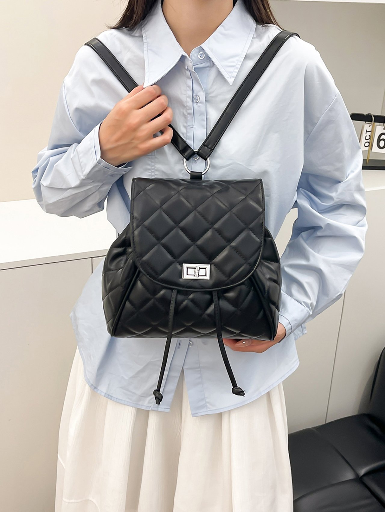 Black Quilted Drawstring Backpack 