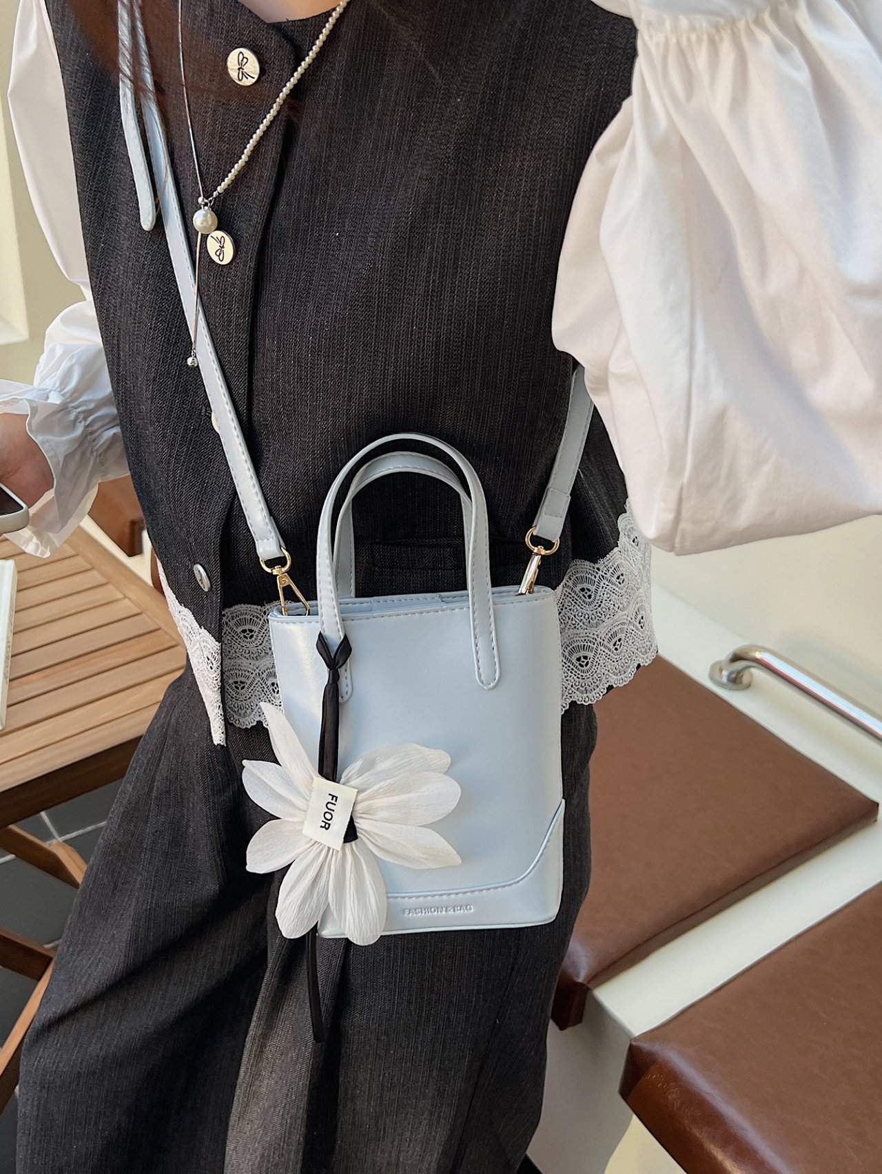 Blue Mini Handbag with Floral Charm