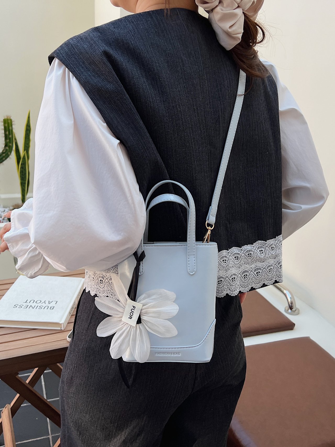 Blue Mini Handbag with Floral Charm