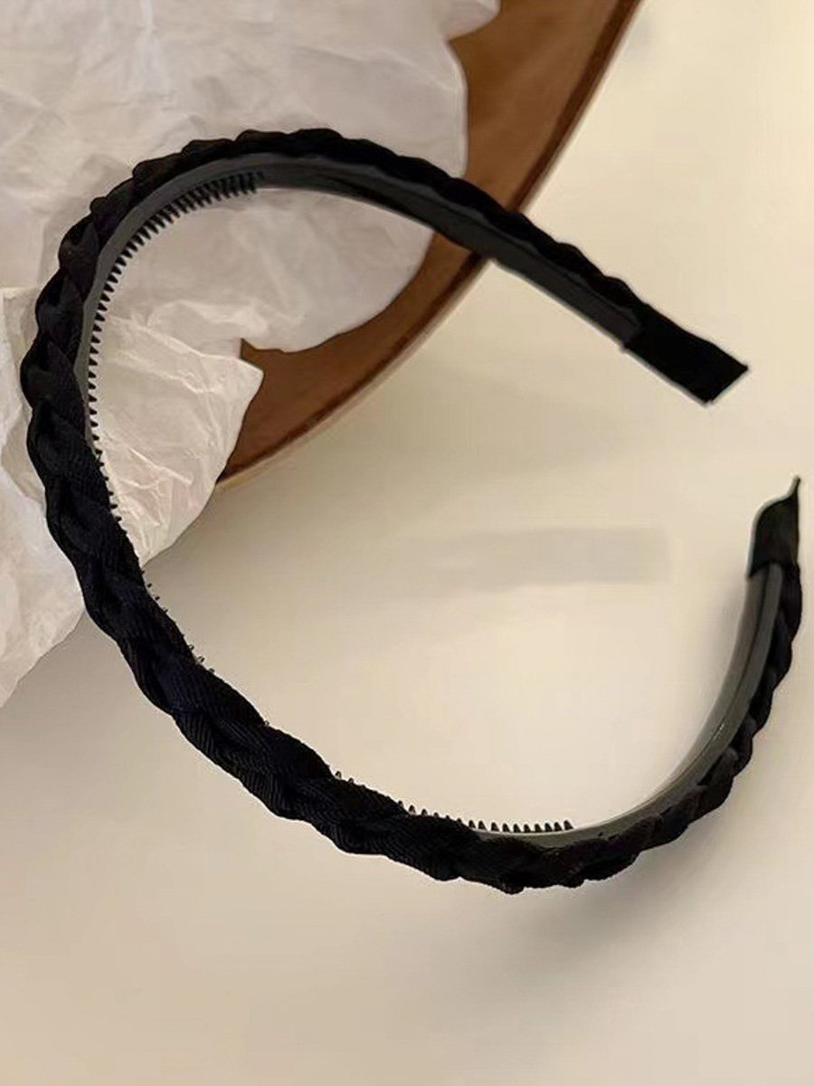 طوق رأس منسوج بأسنان أسود