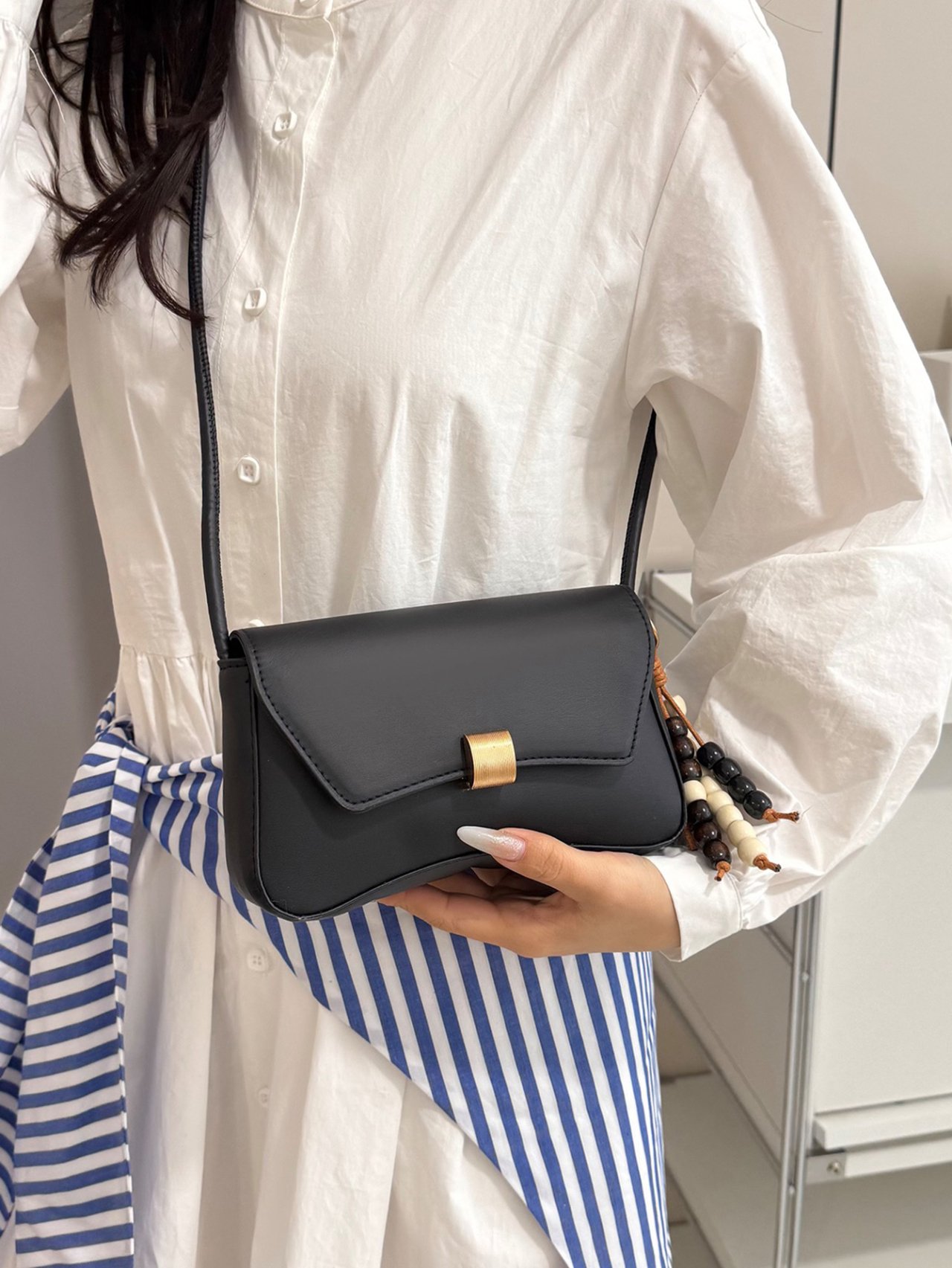 Black Faux Leather Crossbody Bag with Gold Clasp