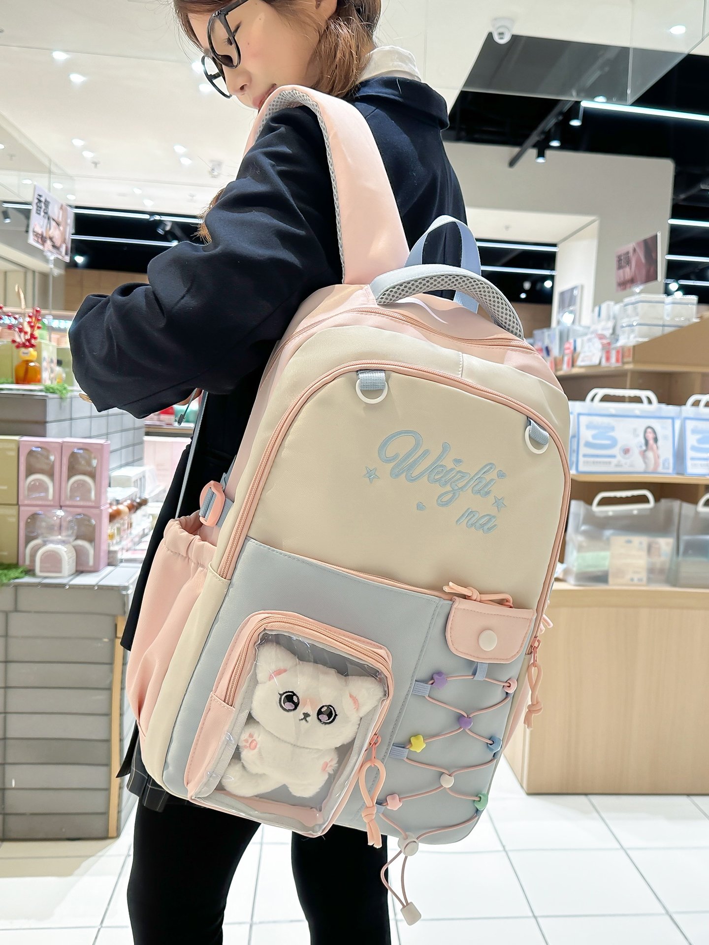 Pastel Pink Backpack with Charm Display