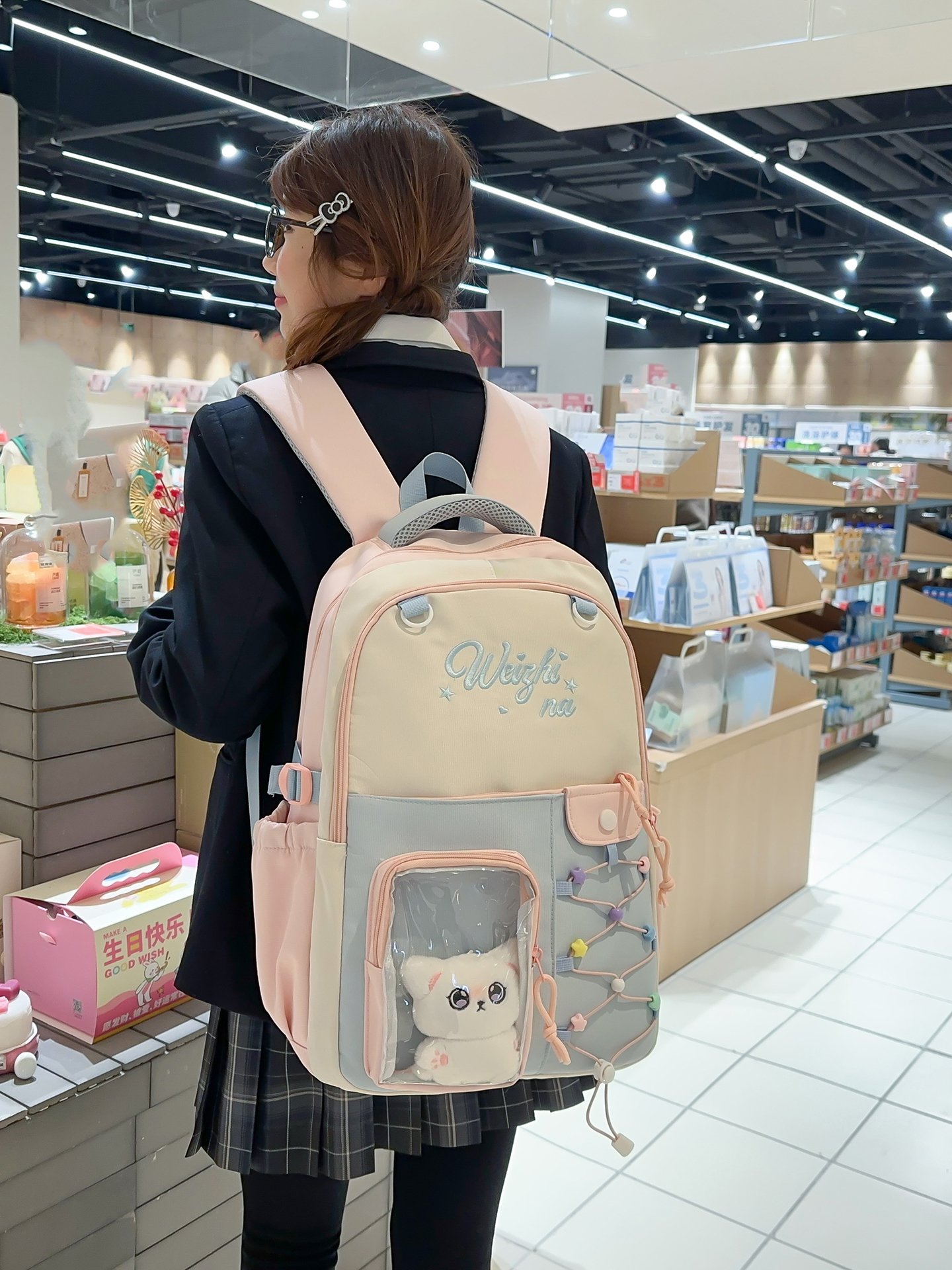 Pastel Pink Backpack with Charm Display