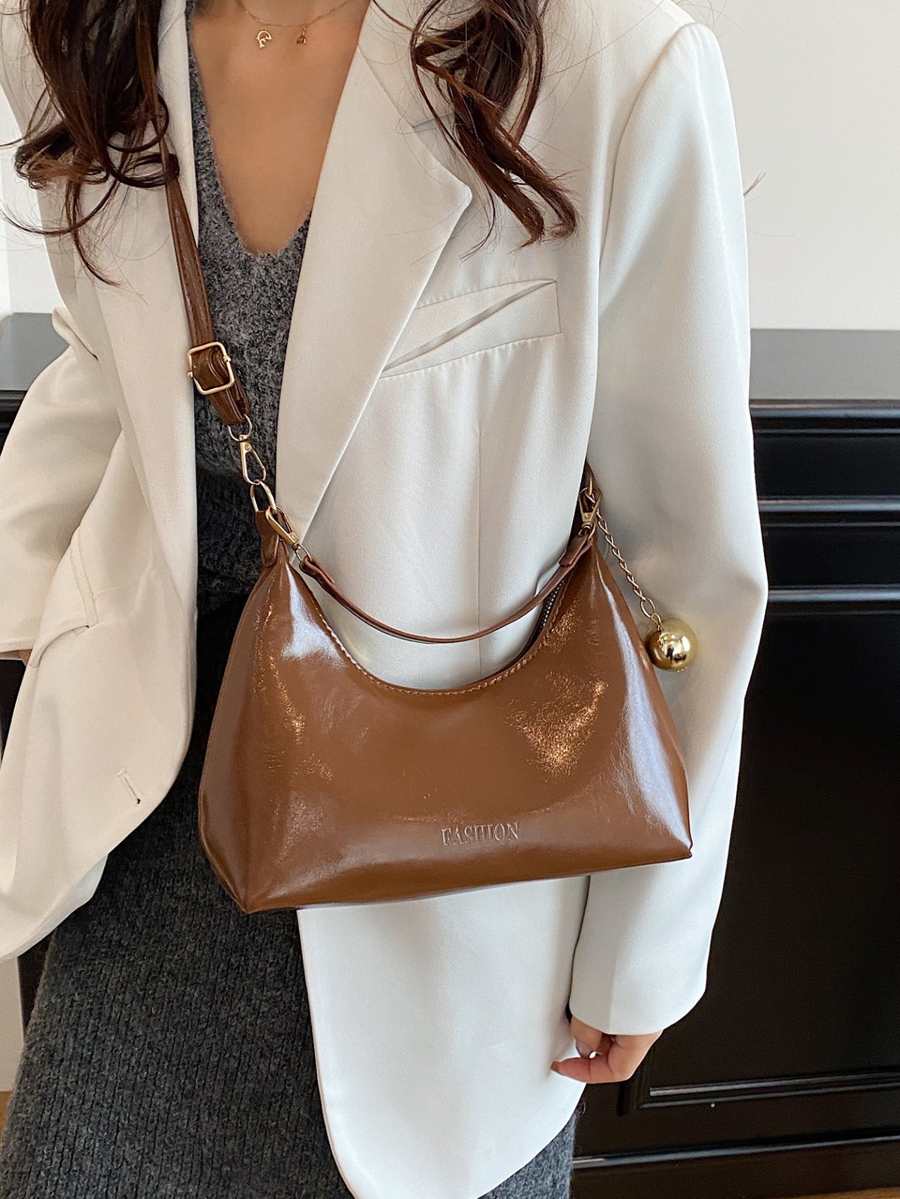 Brown Patent Croissant Crossbody Bag with Charm