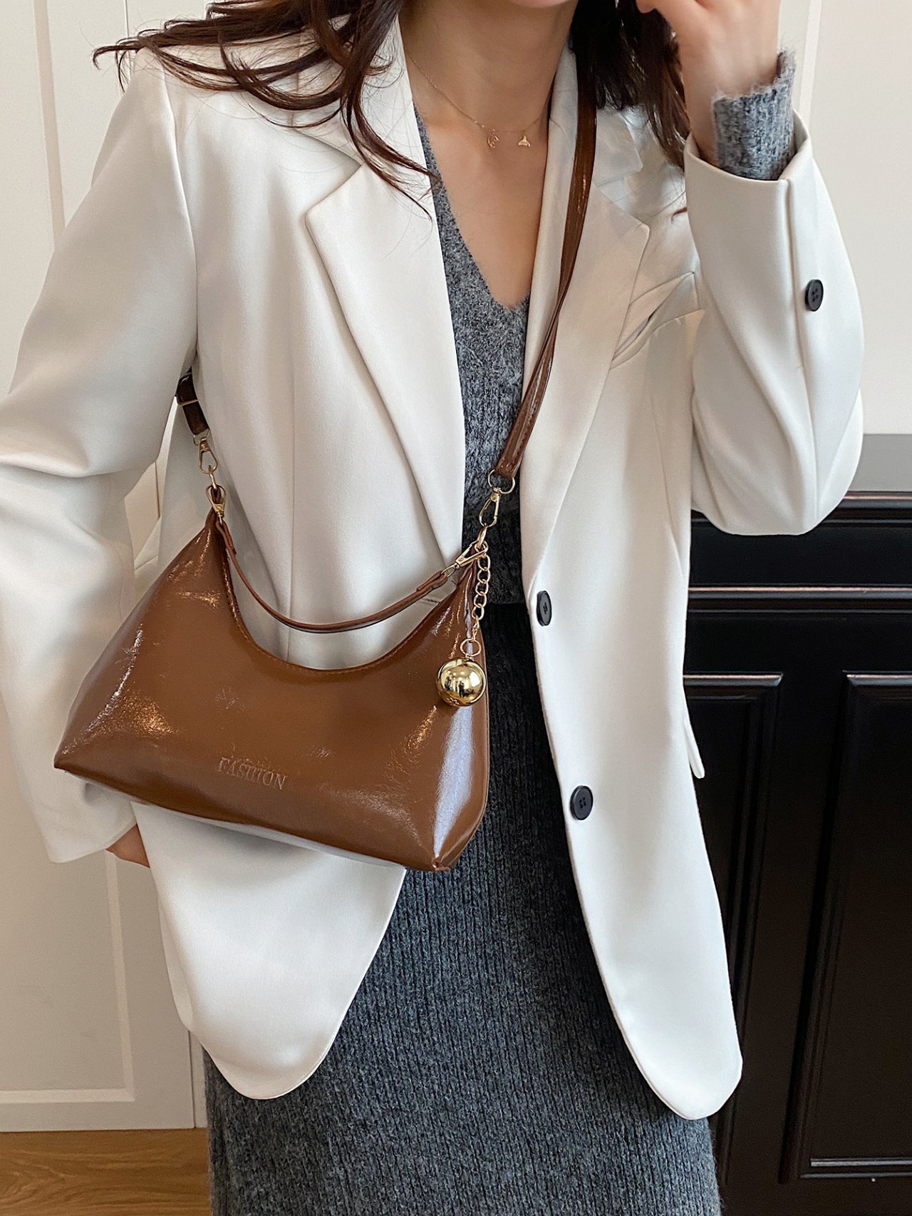 Brown Patent Croissant Crossbody Bag with Charm