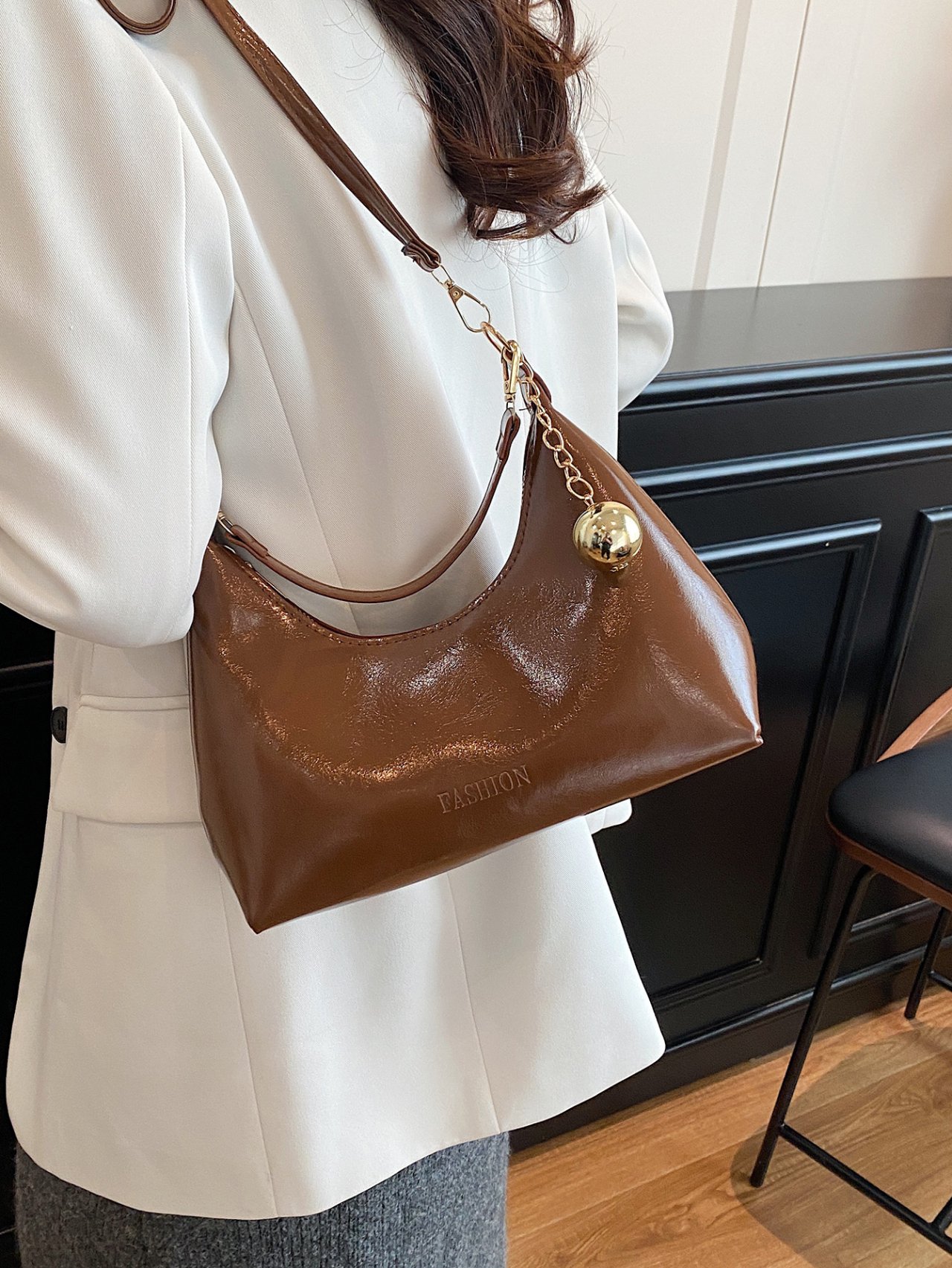 Brown Patent Croissant Crossbody Bag with Charm