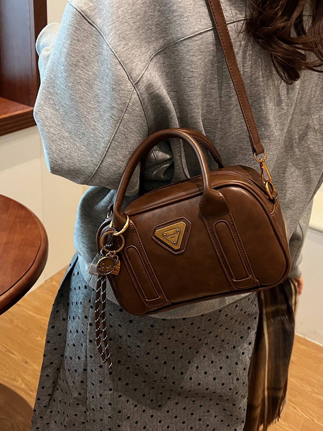 Brown Crossbody Bag with Charm Detail
