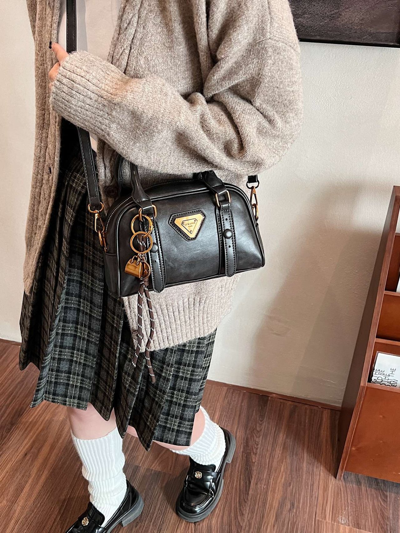 Black Crossbody Bag with Charm Detail