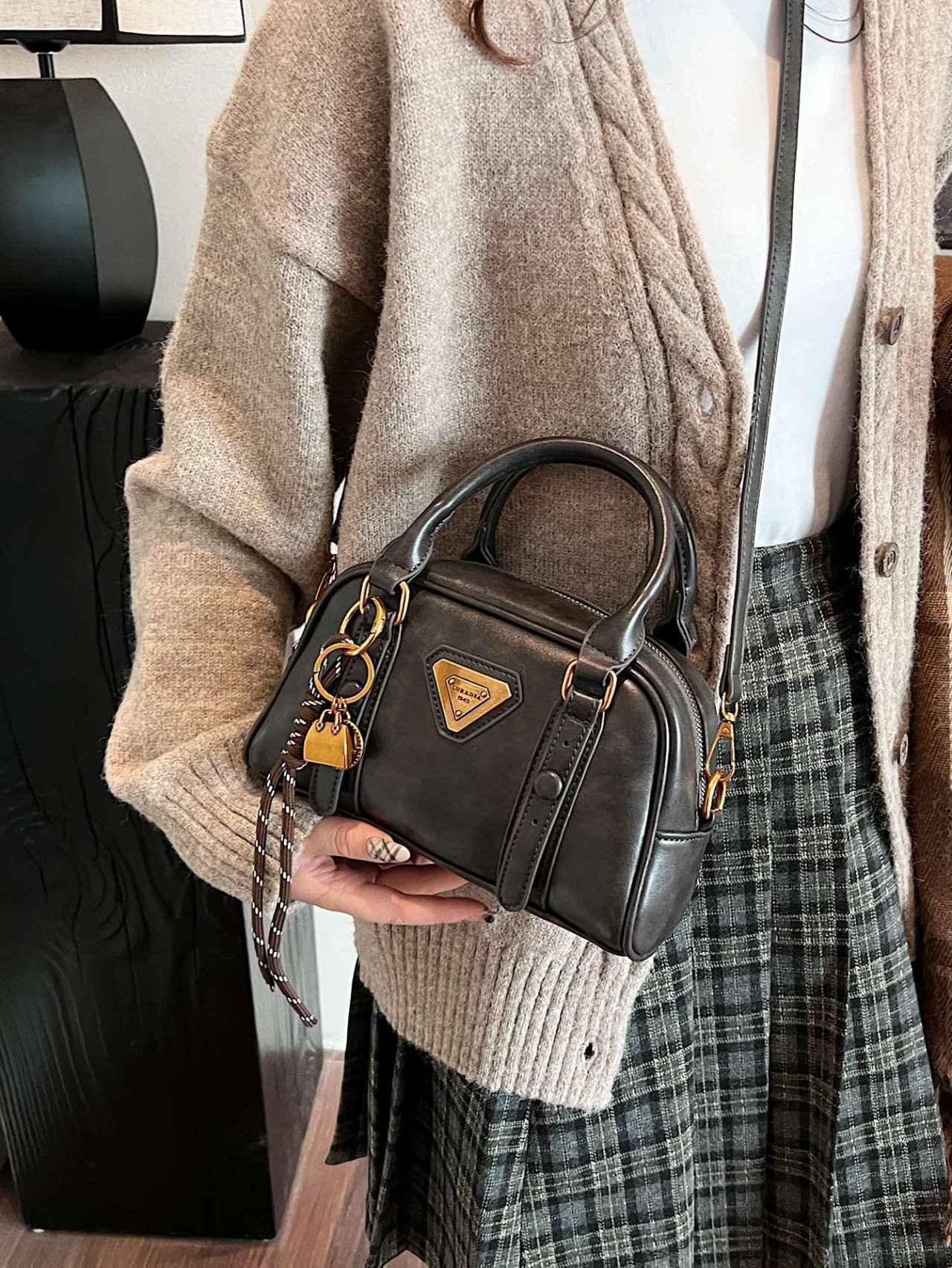 Black Crossbody Bag with Charm Detail