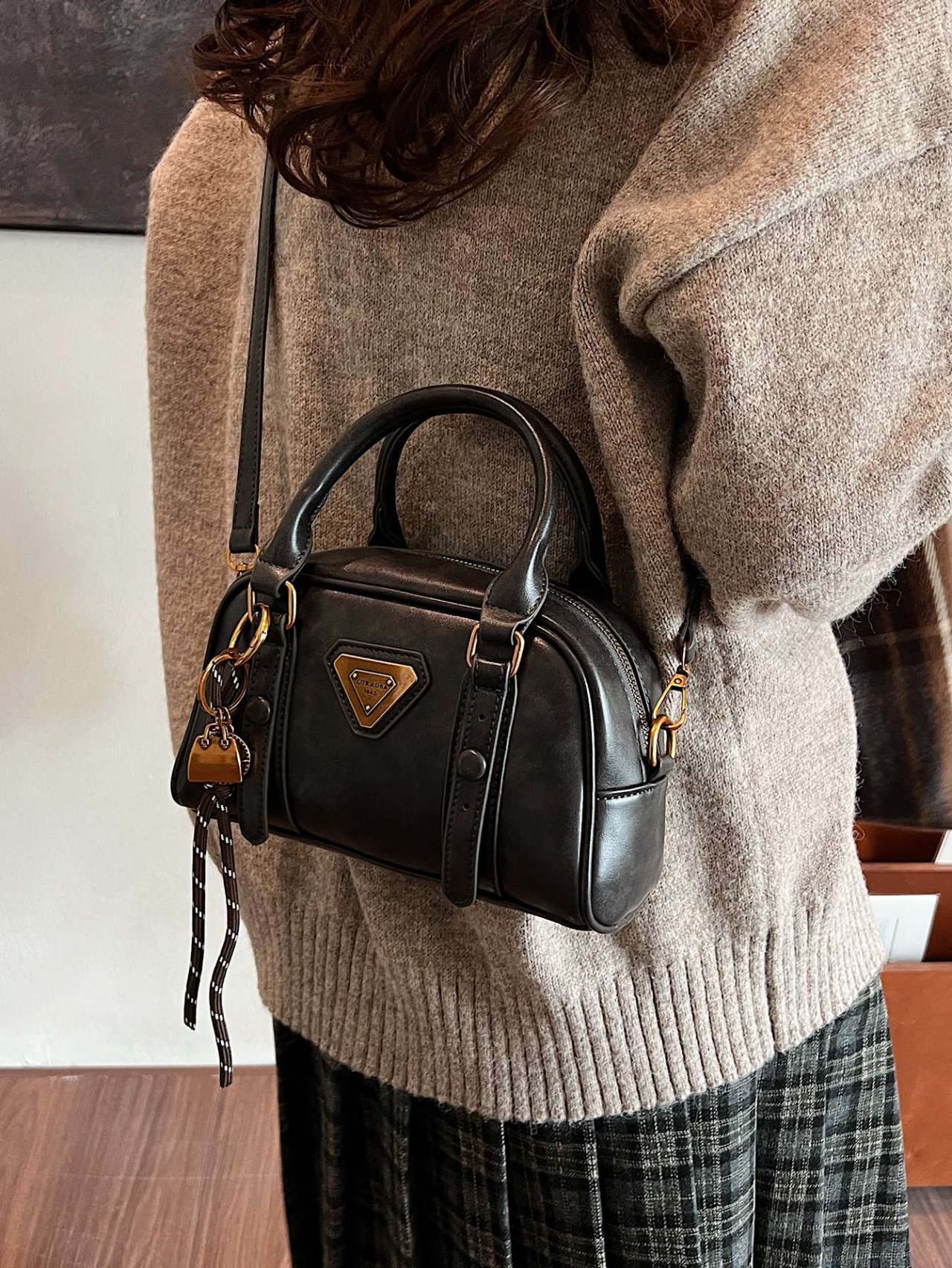 Black Crossbody Bag with Charm Detail