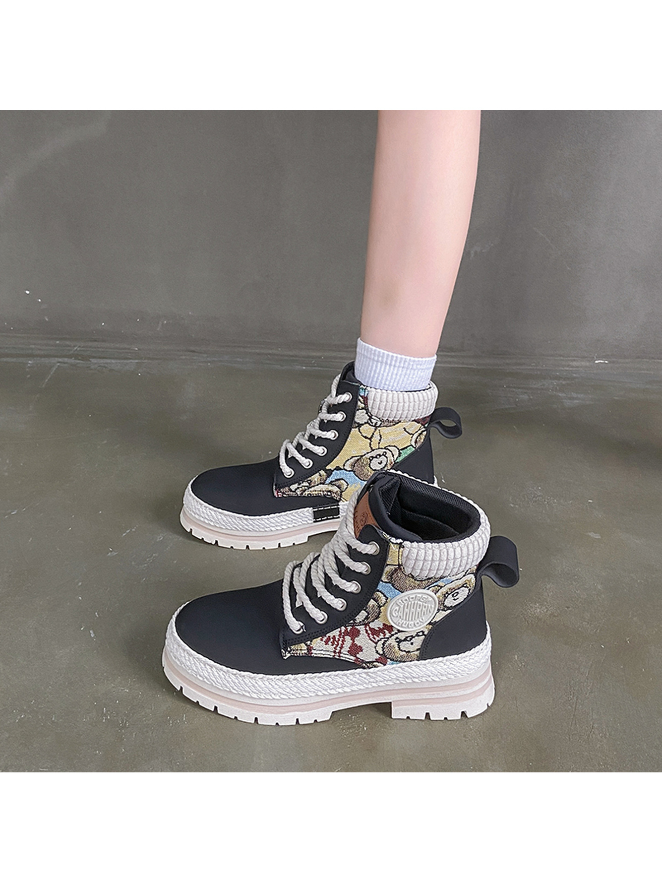 Black High-Top Fashion Sneakers with Patterned Detail