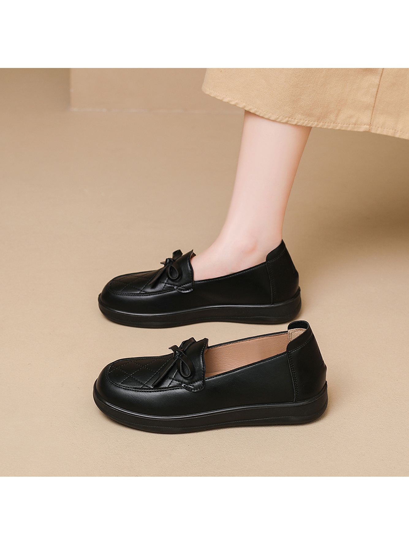 Black Quilted Bow Slip-On Flats
