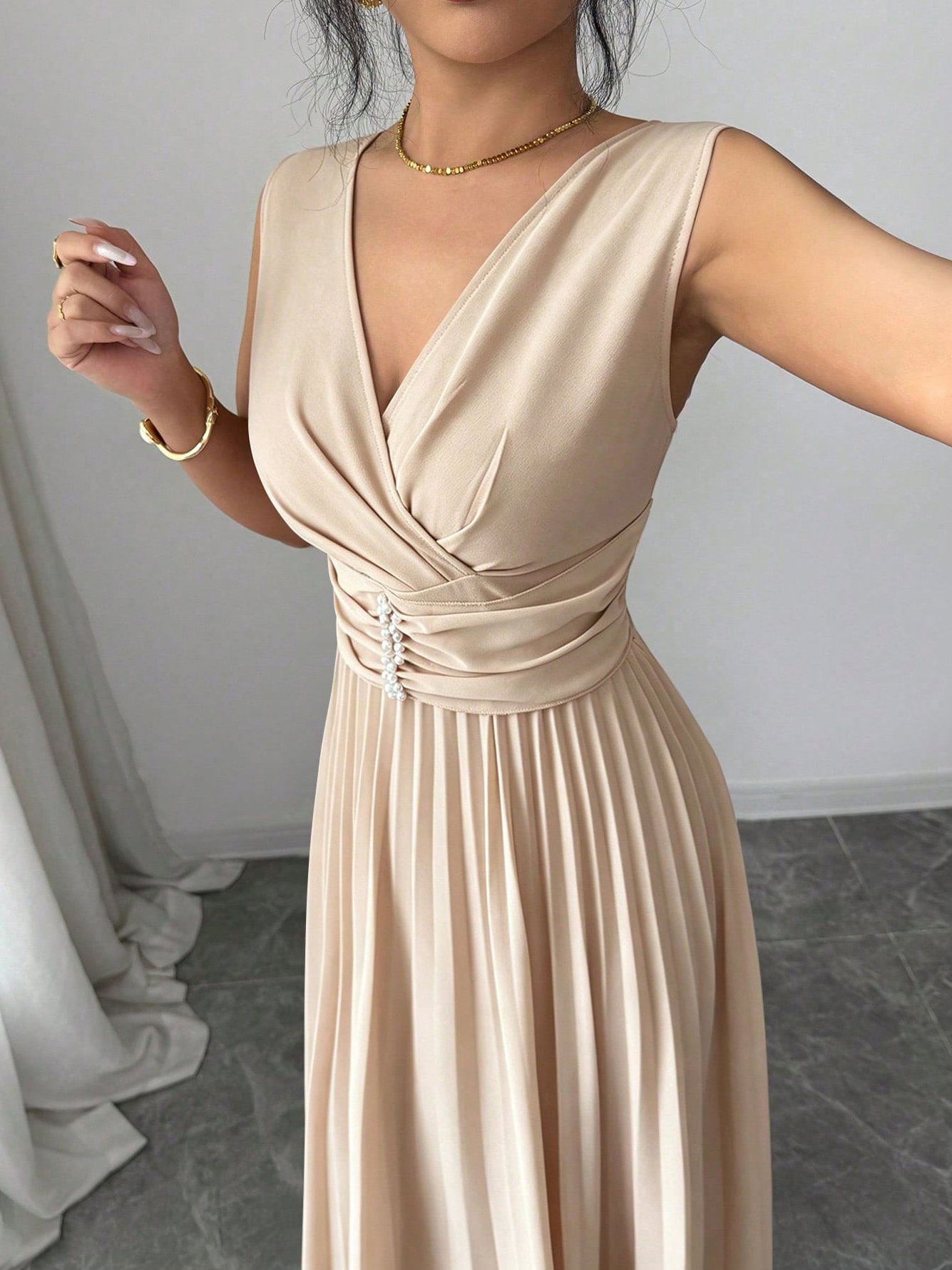 Beige Sleeveless A-Line Midi Dress with Pleated Skirt