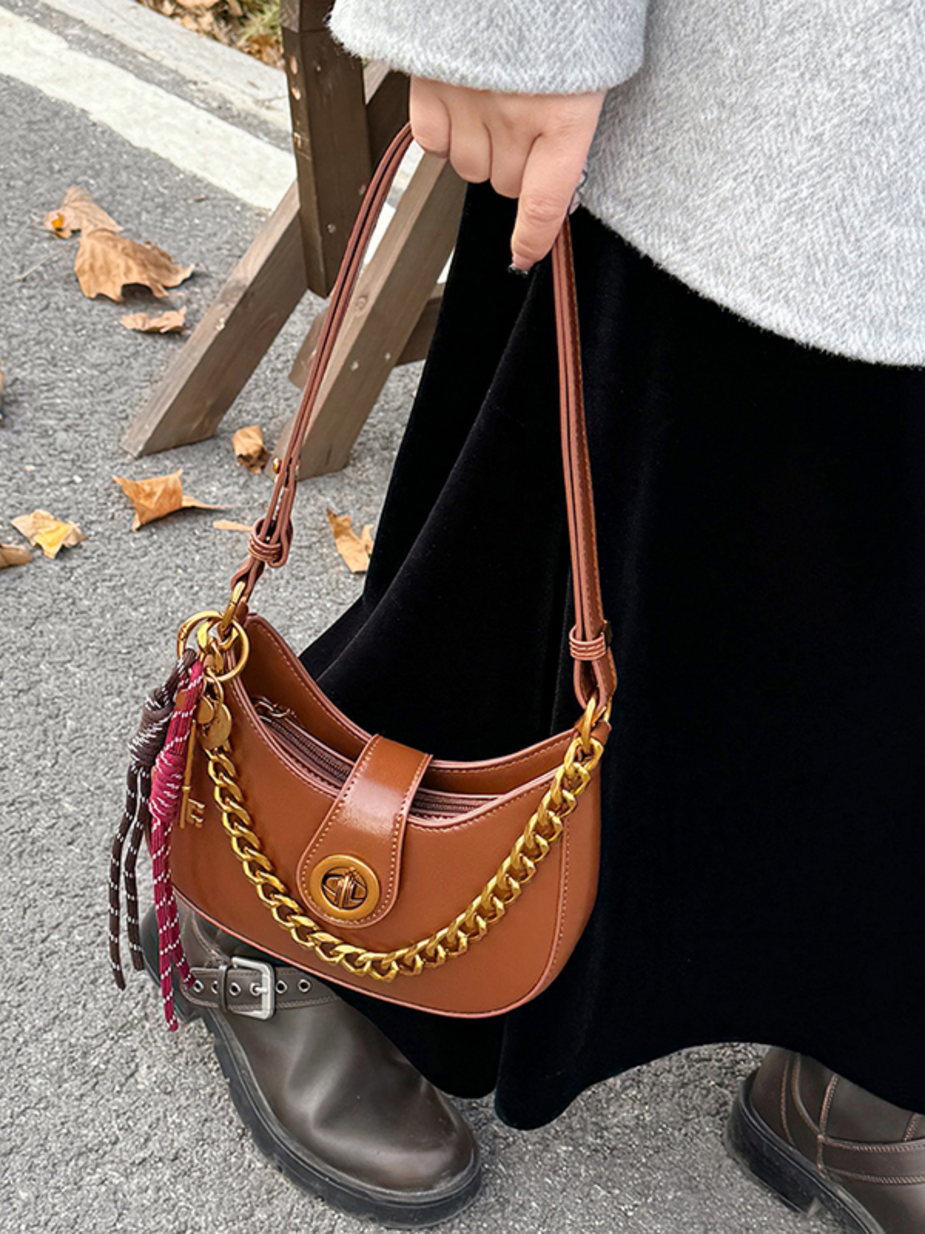 Brown Crescent Handbag with Gold Chain Detail